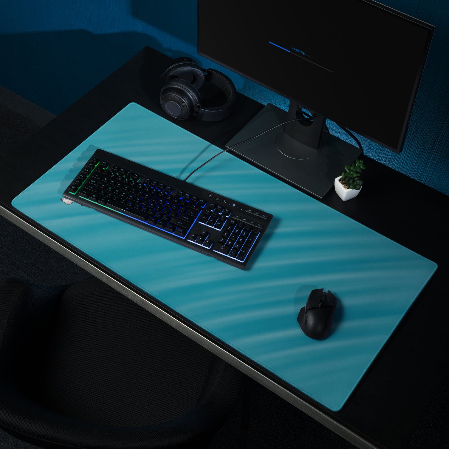 36" x 18" desk pad with a gangster polar bear and his car shown on a desk setup. Blue in color.