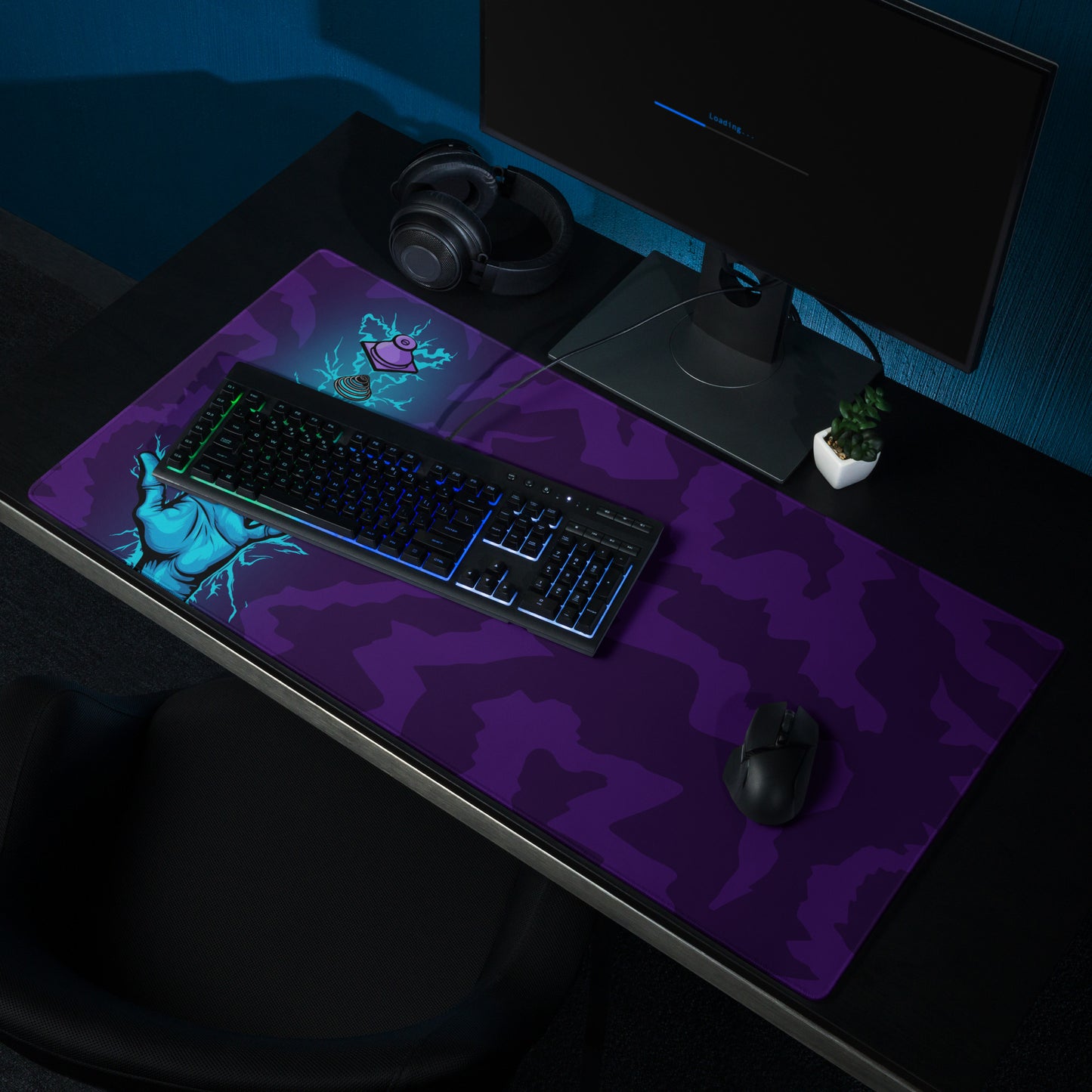 A 36" x 18" desk pad with a hand touching a broken down view of a Topre switch shown on a desk setup. Purple in color.
