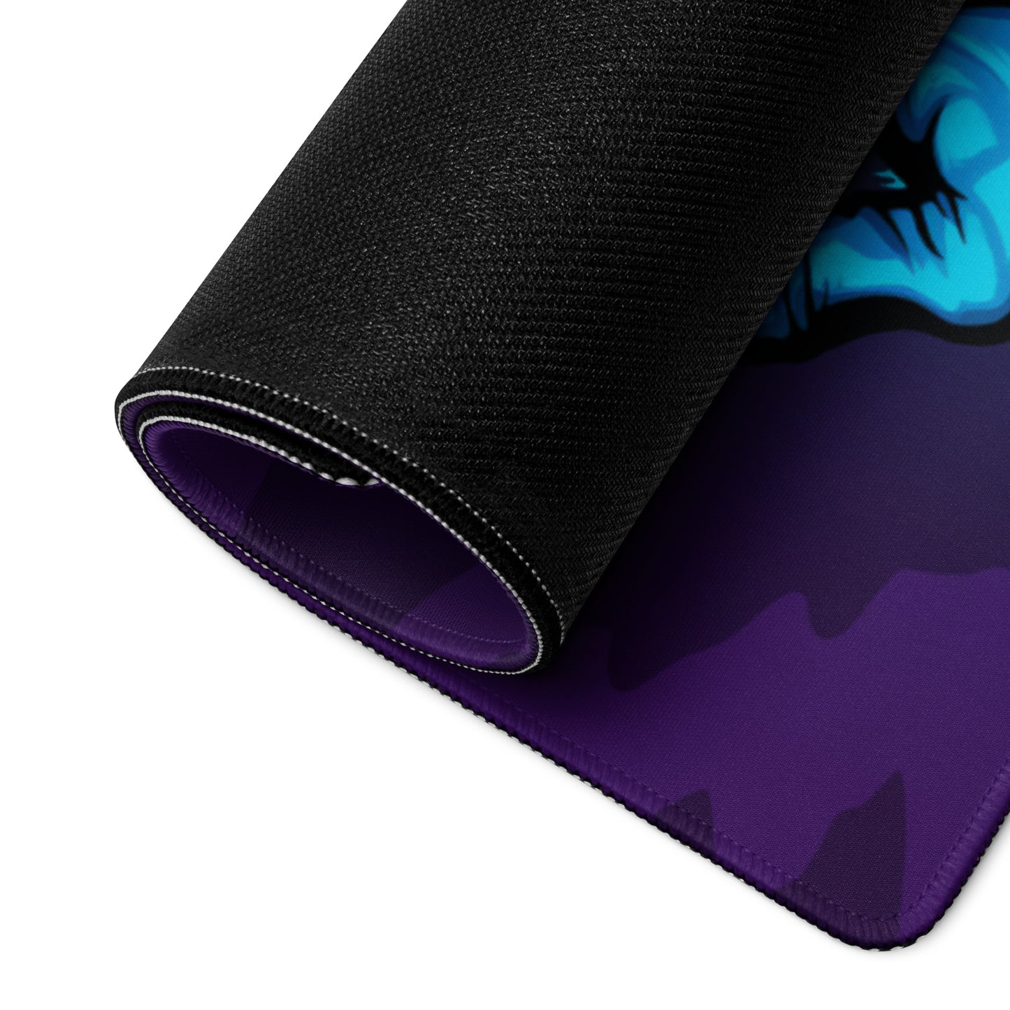 A 36" x 18" desk pad with a hand touching a broken down view of a Topre switch rolled up. Purple in color.