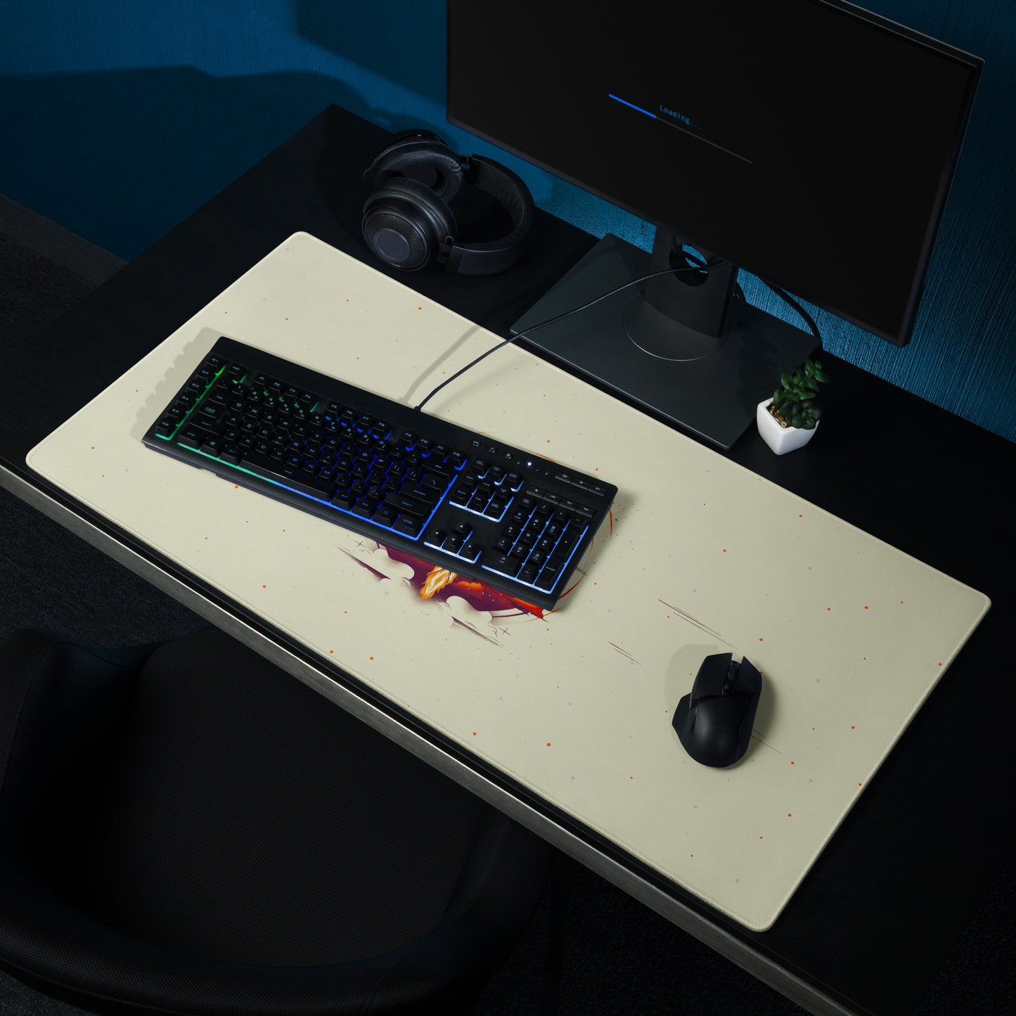A 36" x 18" desk pad with a space shuttle blasting off sitting on a desk. Beige in color.