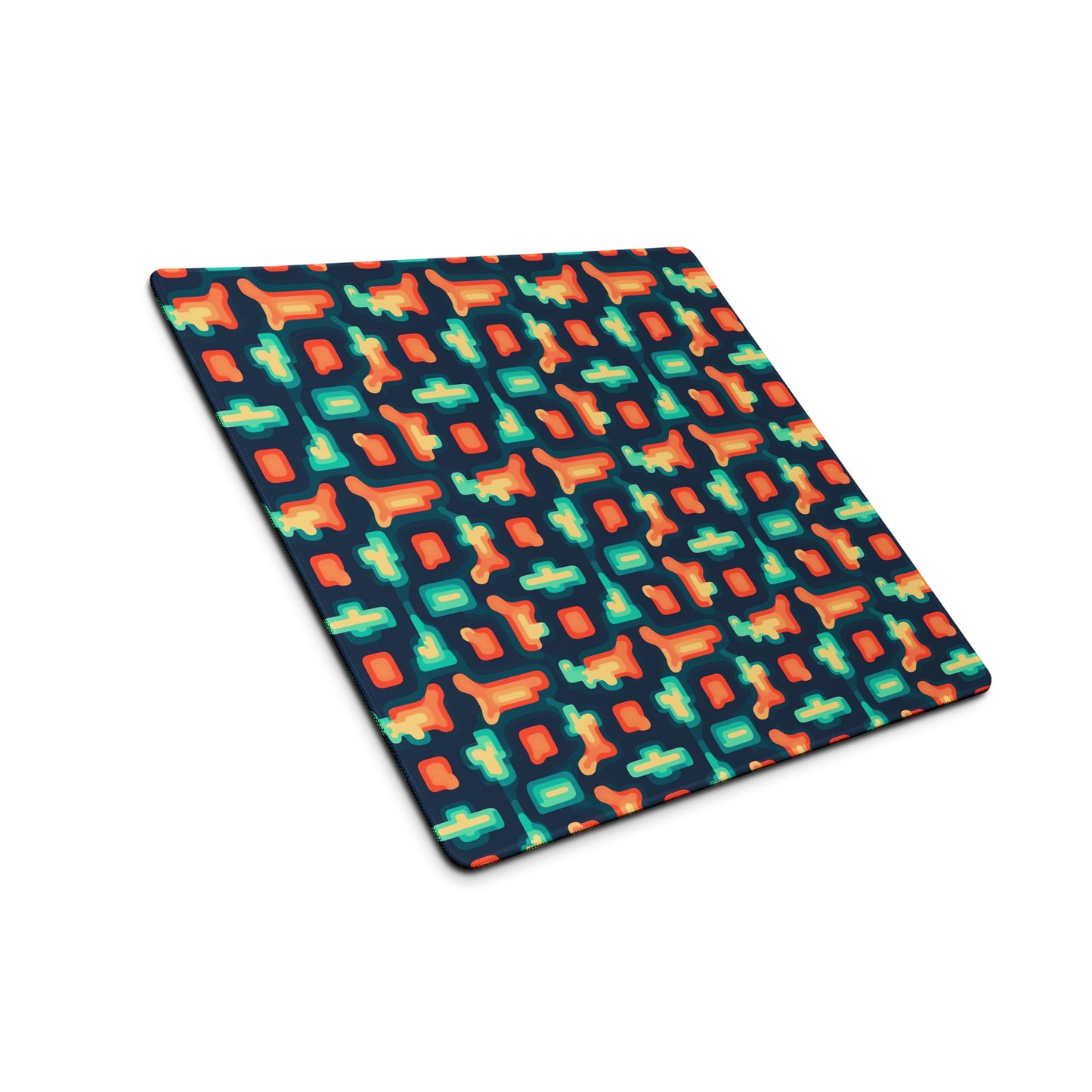 An 18" x 16" gaming desk pad with blue and orange puzzle pieces on a dark blue background sitting at an angle.