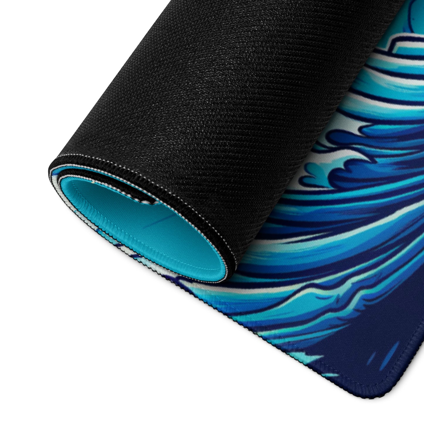 A 36" x 18" blue and orange desk pad with a soda can in the middle rolled up.