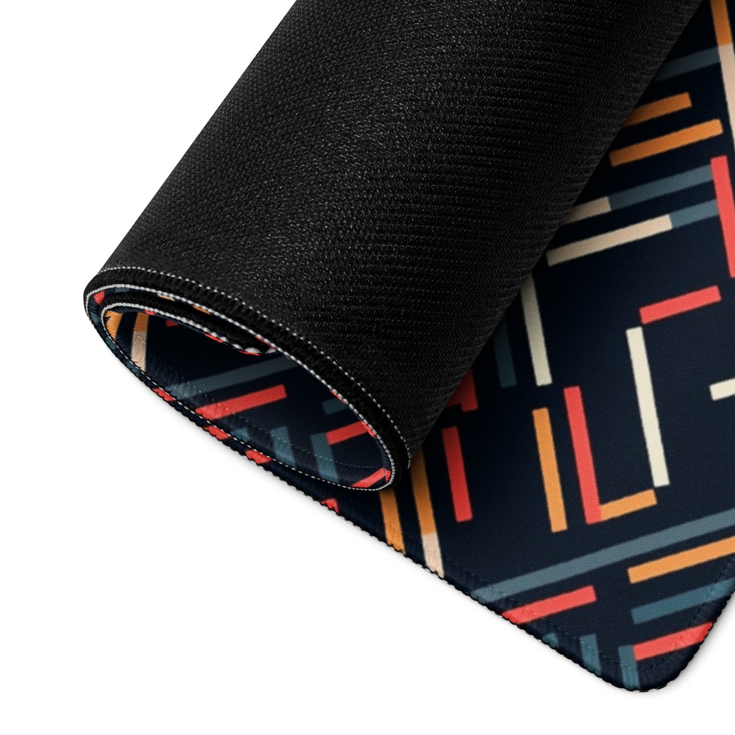 A disconnected gaming desk pad rolled up.