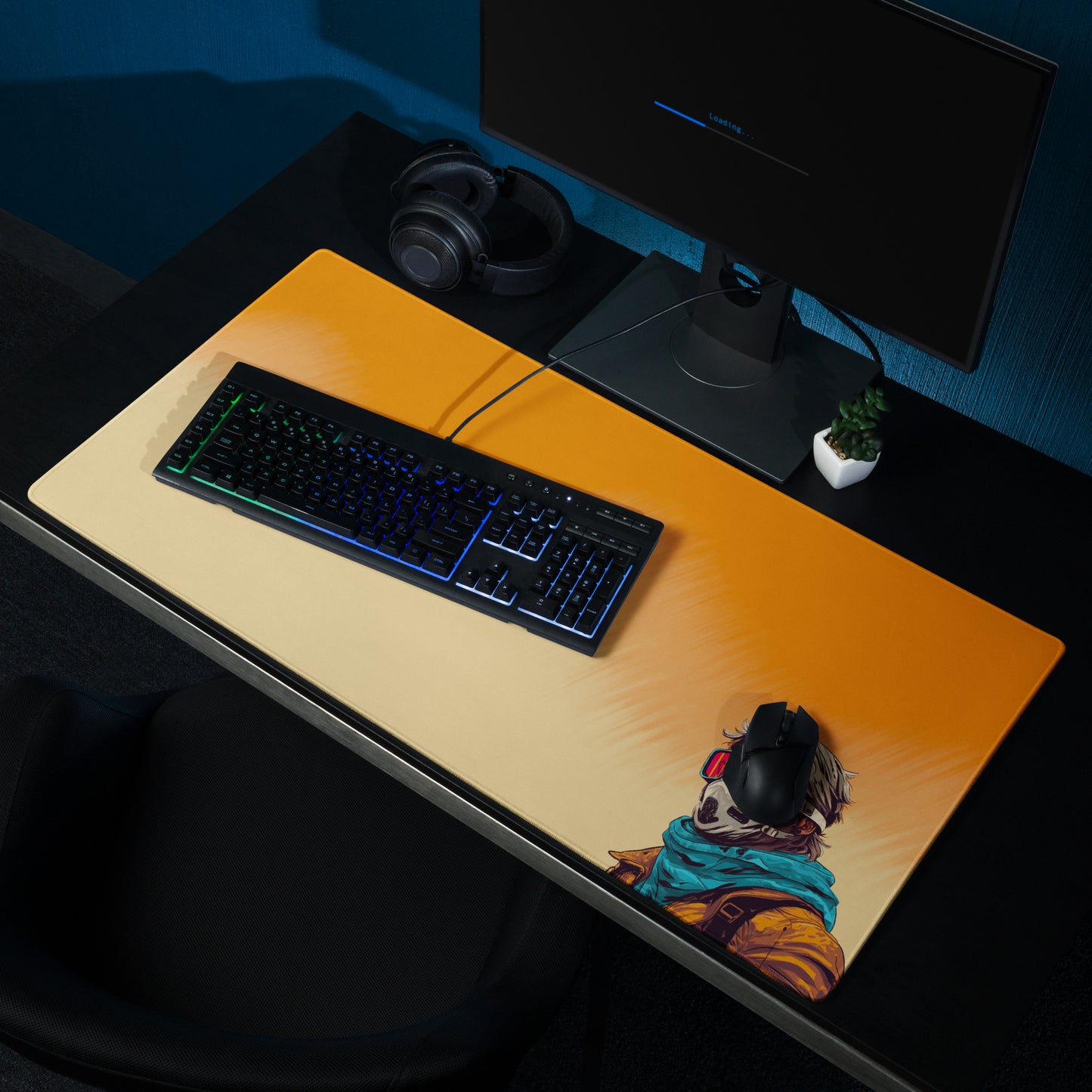 A 36" x 18" desk pad with a man standing in a sandstorm sitting on a desk.