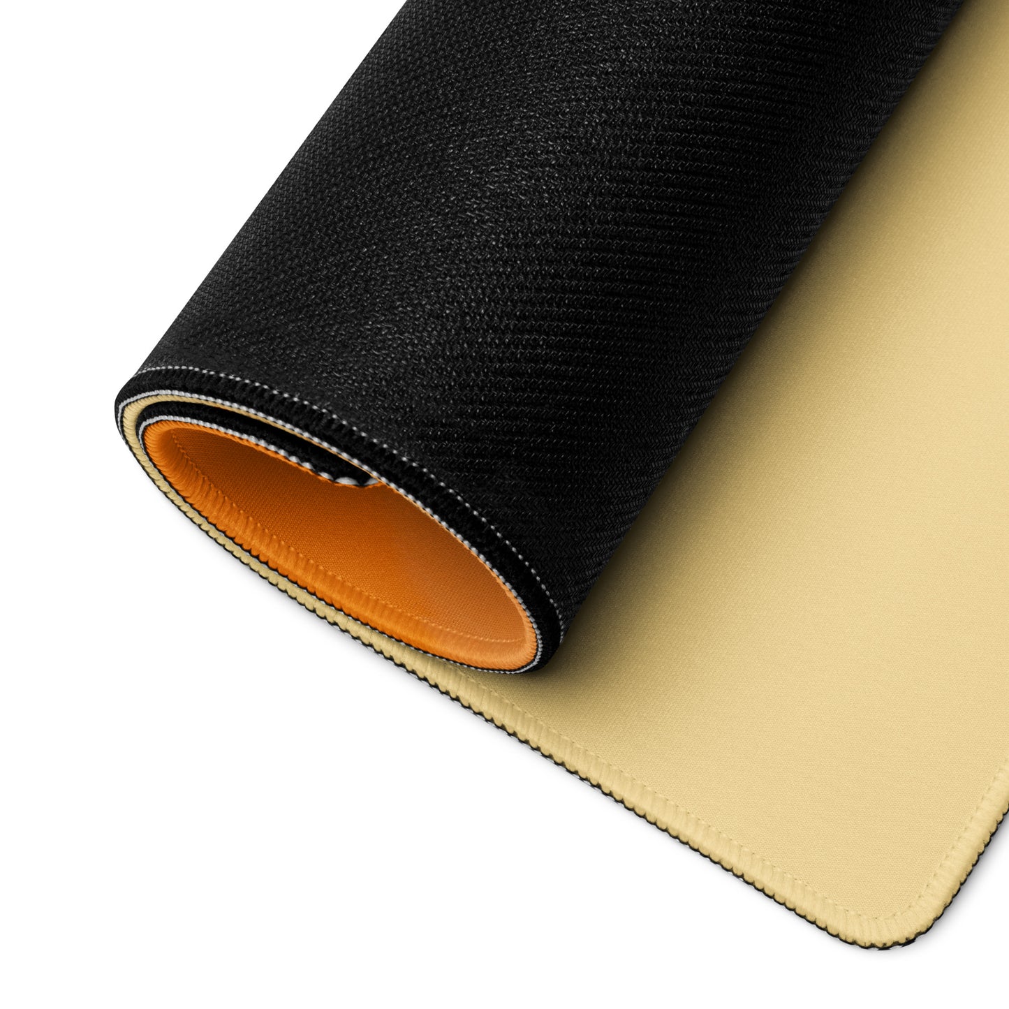 A 36" x 18" desk pad with a man standing in a sandstorm rolled up.