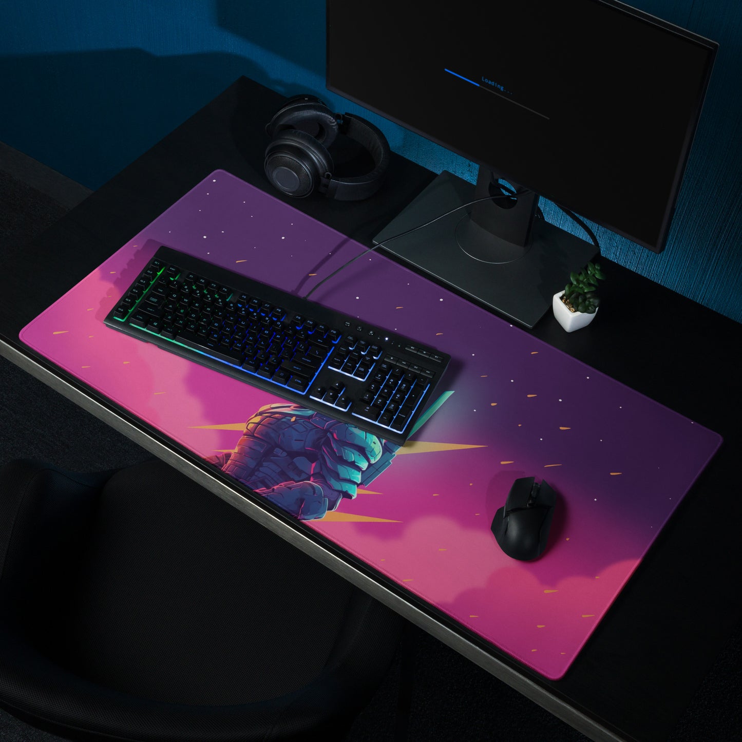 A 36" x 18" pink and purple desk pad with a futuristic samurai sitting on a desk.