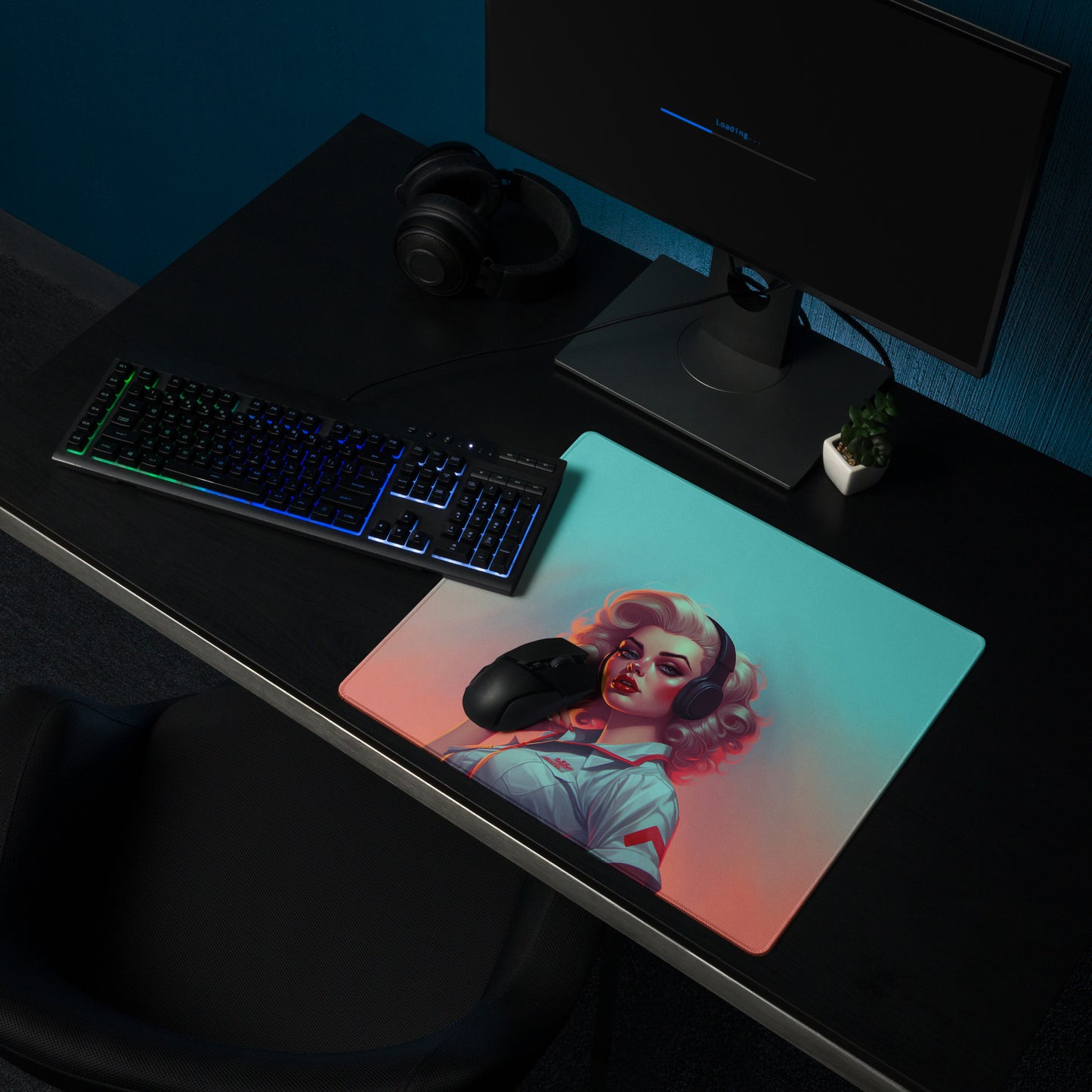 A 18" x 16" blue and orange desk pad with a flight attendant sitting on a desk.