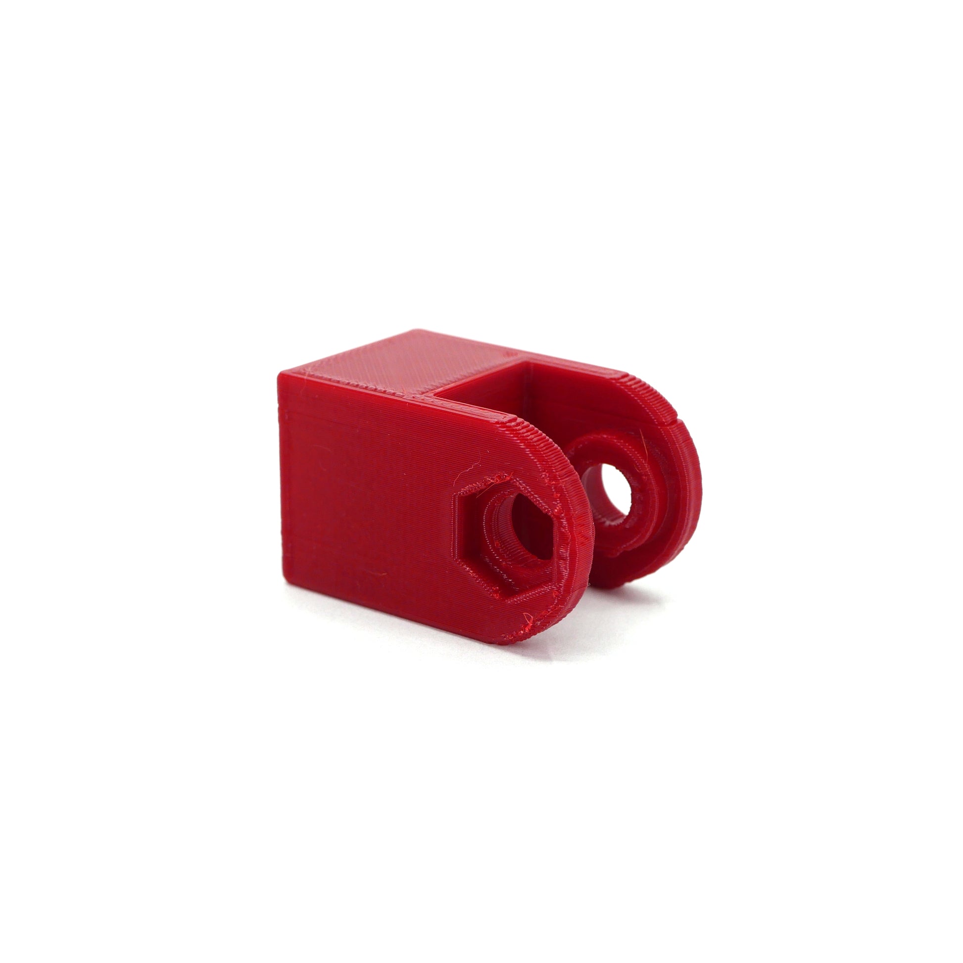 A red HyperX QuadCast microphone mount adapter.