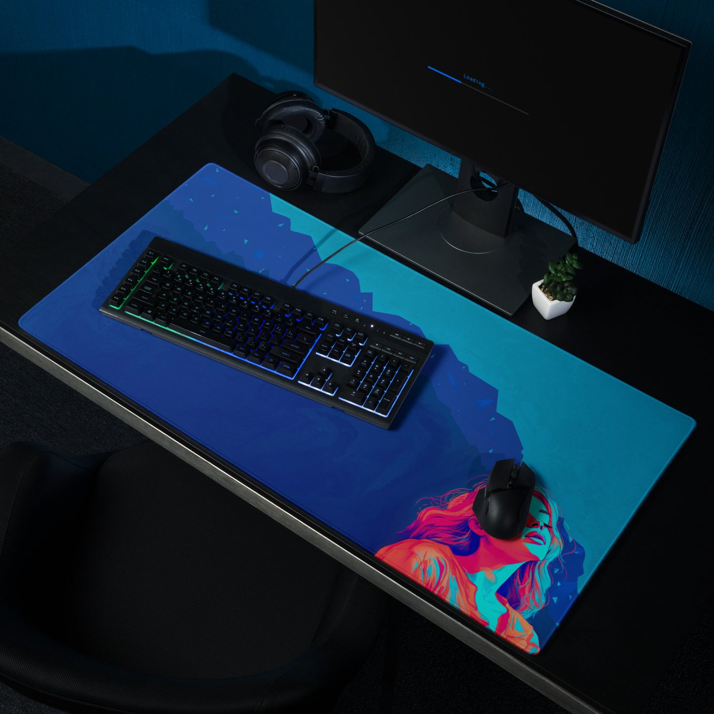 A 36" x 18" blue desk pad with a girl looking up sitting on a desk.