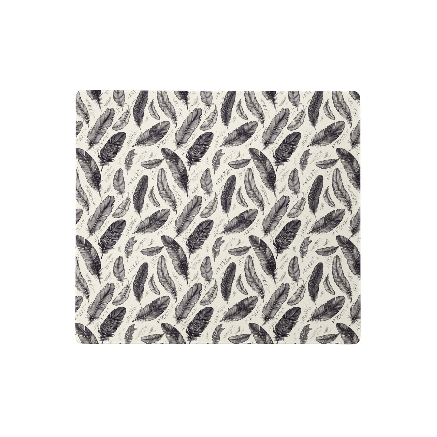 An 18" x 16" gaming desk pad with black and white feathers.