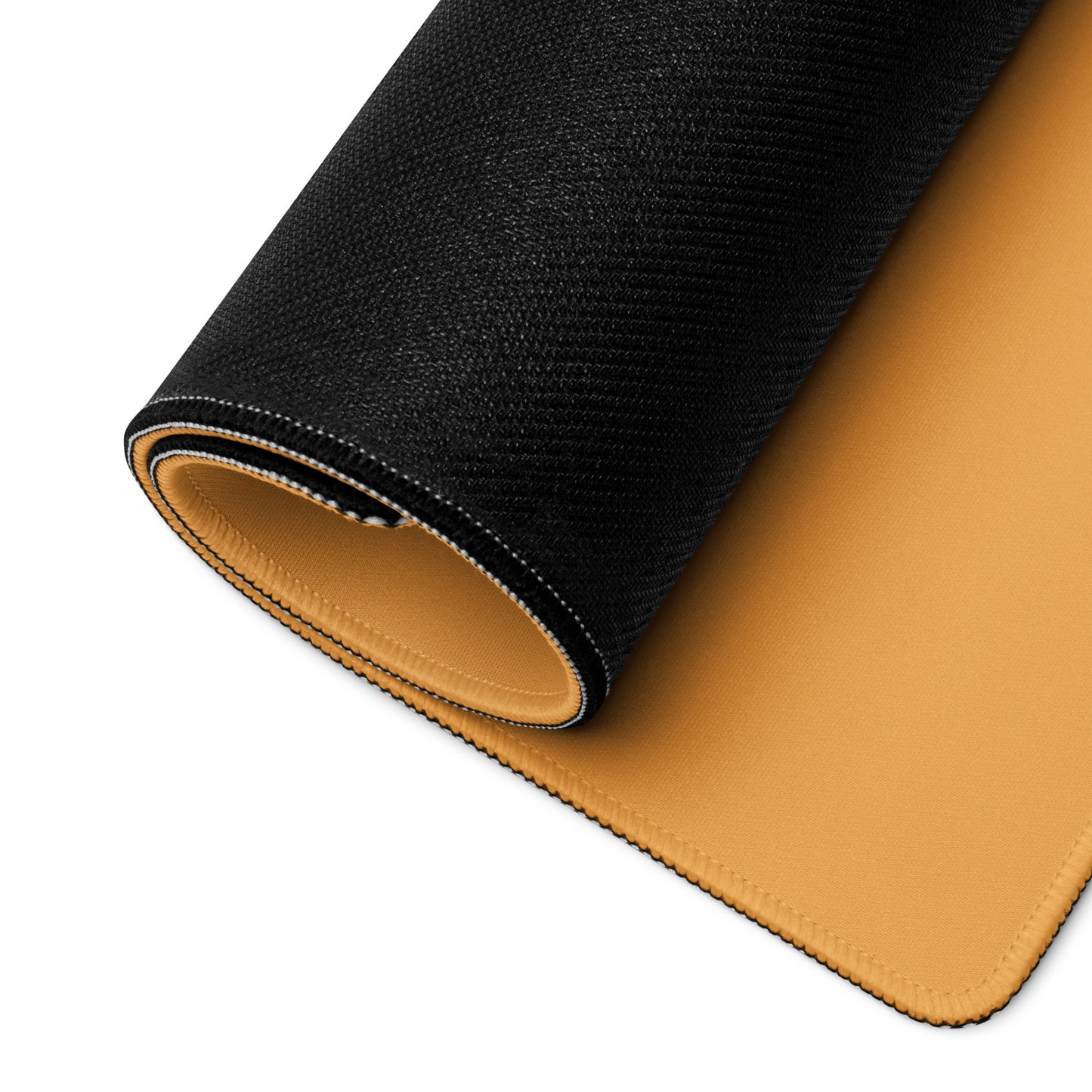 An orange 36" x 18" desk pad with cowboys dueling rolled up.