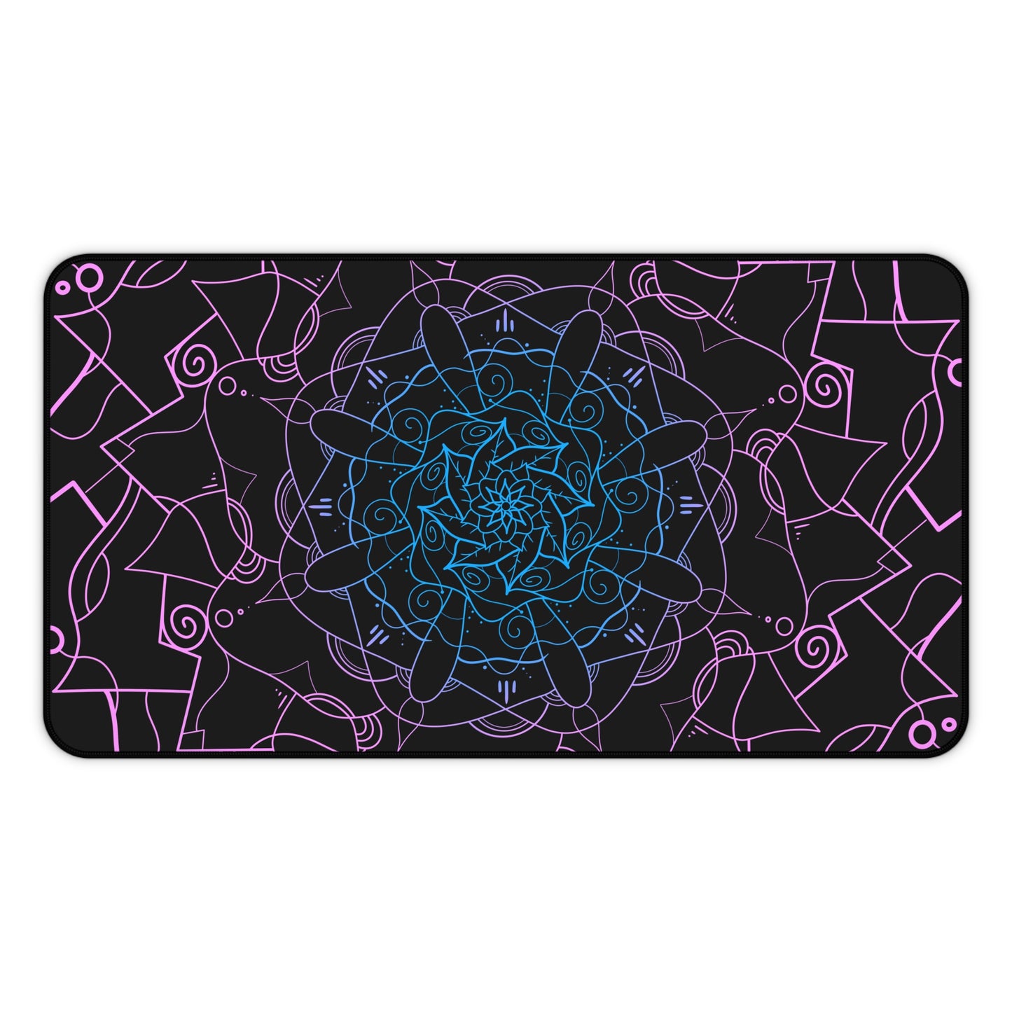 A 12" x 22" desk mat with a pink and blue mandala pattern on a black background.