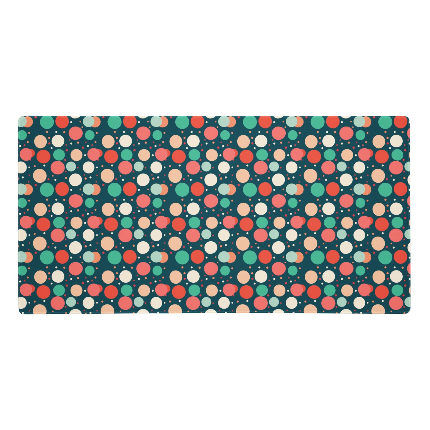 A 36" x 18" desk pad with red teal and yellow polka dot pattern.