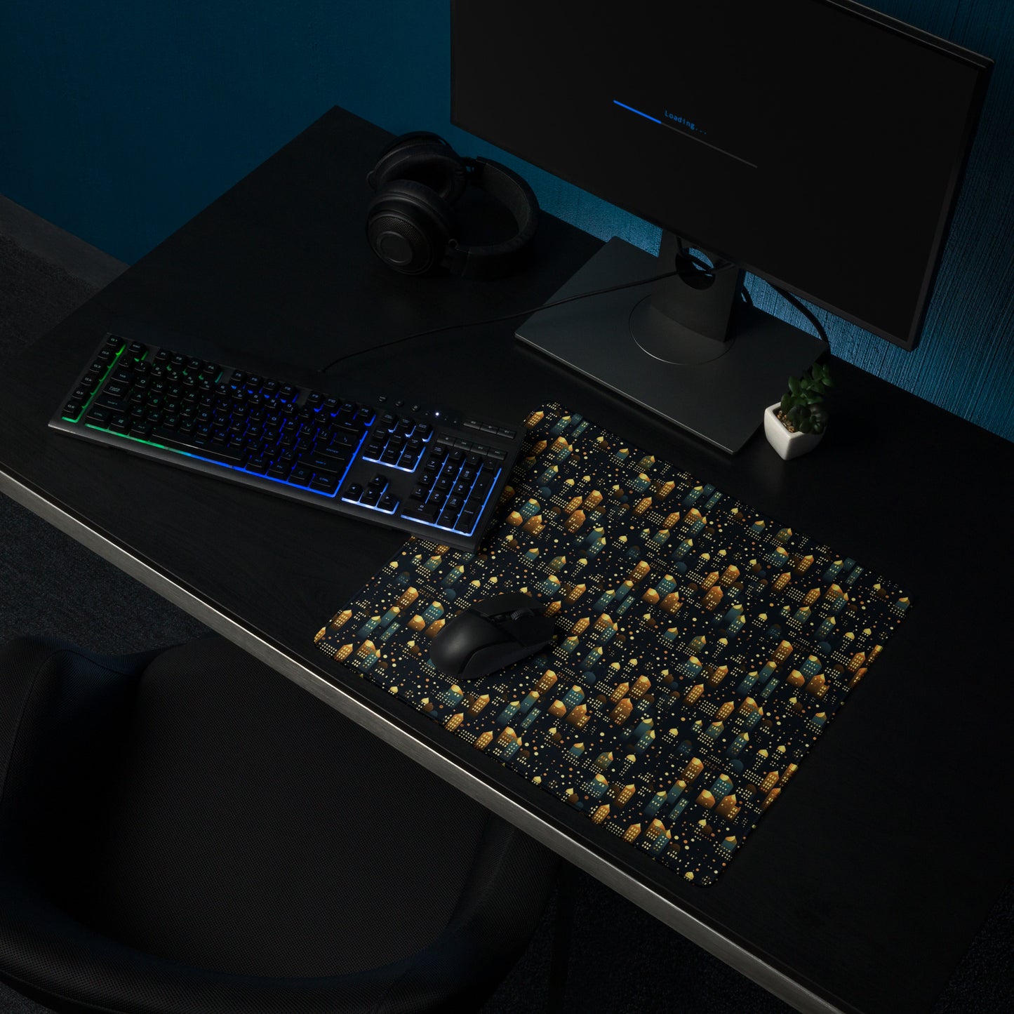 A 18" x 16" desk pad with a stary city pattern sitting on a desk.