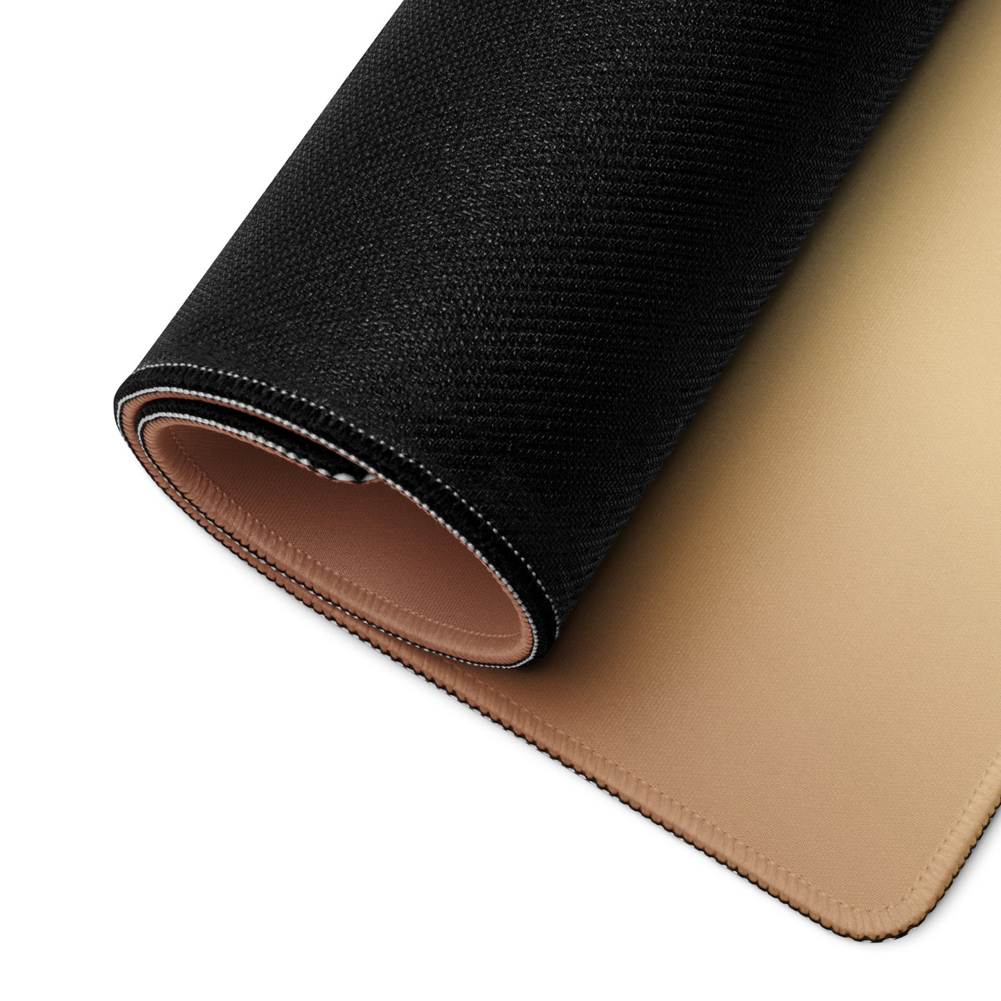 A beige gaming desk pad with the quote It's me, hi! I'm the problem, it's me. The desk pad is rolled up.