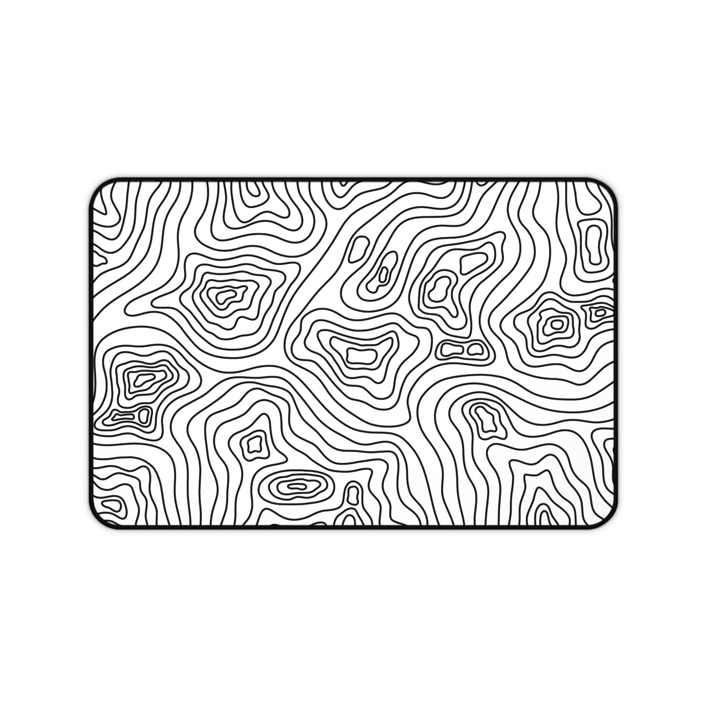 A 12" x 18" white desk mat with black topographic lines.