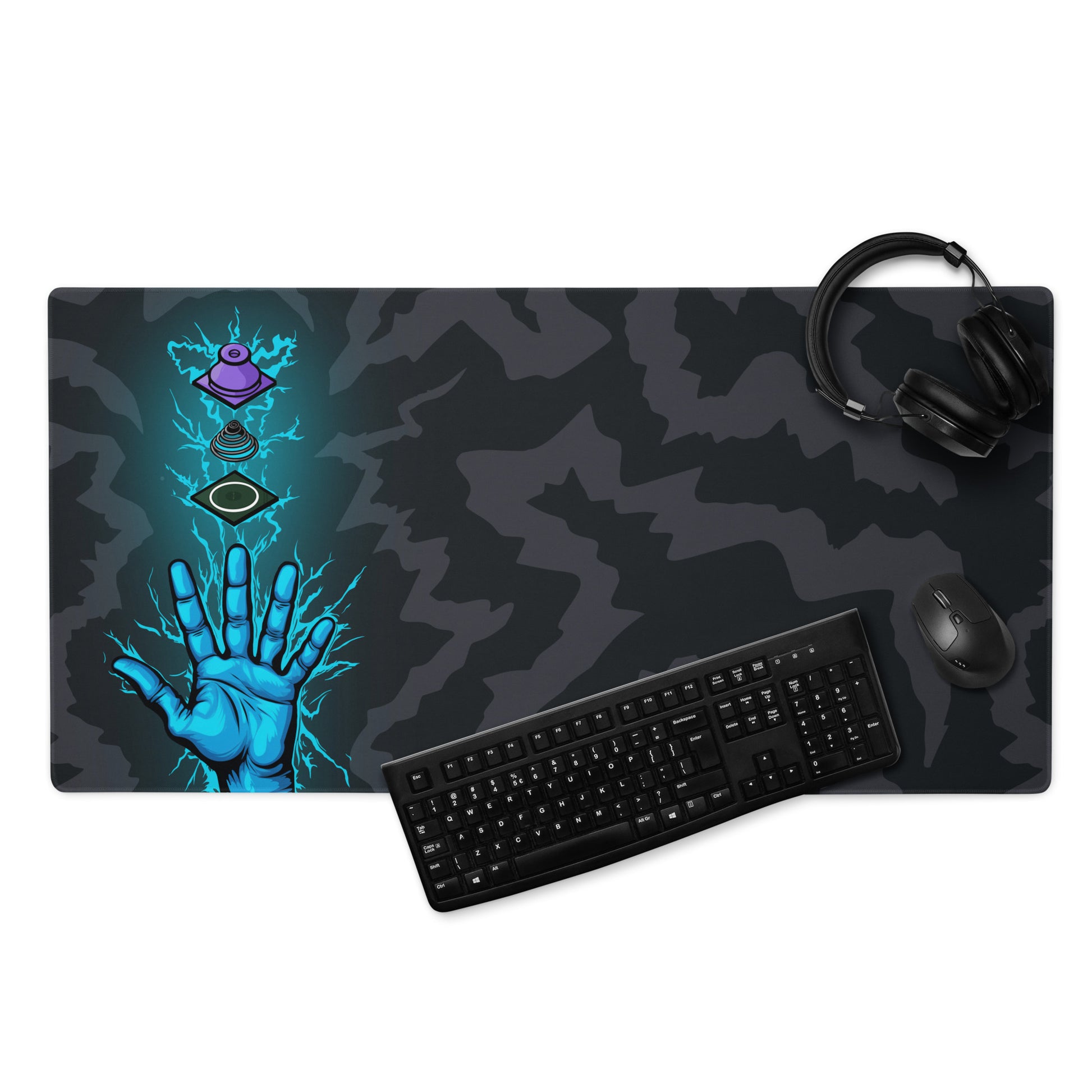 A 36" x 18" desk pad with a hand touching a deconstructed Topre switch surrounded by electricity displayed with a keyboard, headphones and a mouse. Black and Charcoal in color.