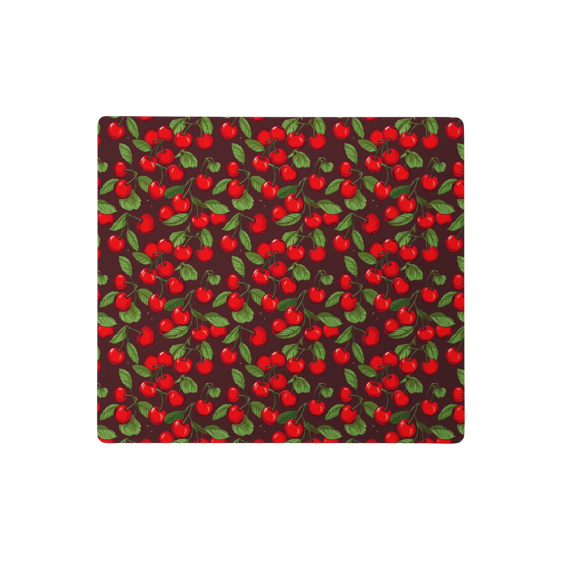 A 18" x 16" desk pad with cherries all over it. Red in color.