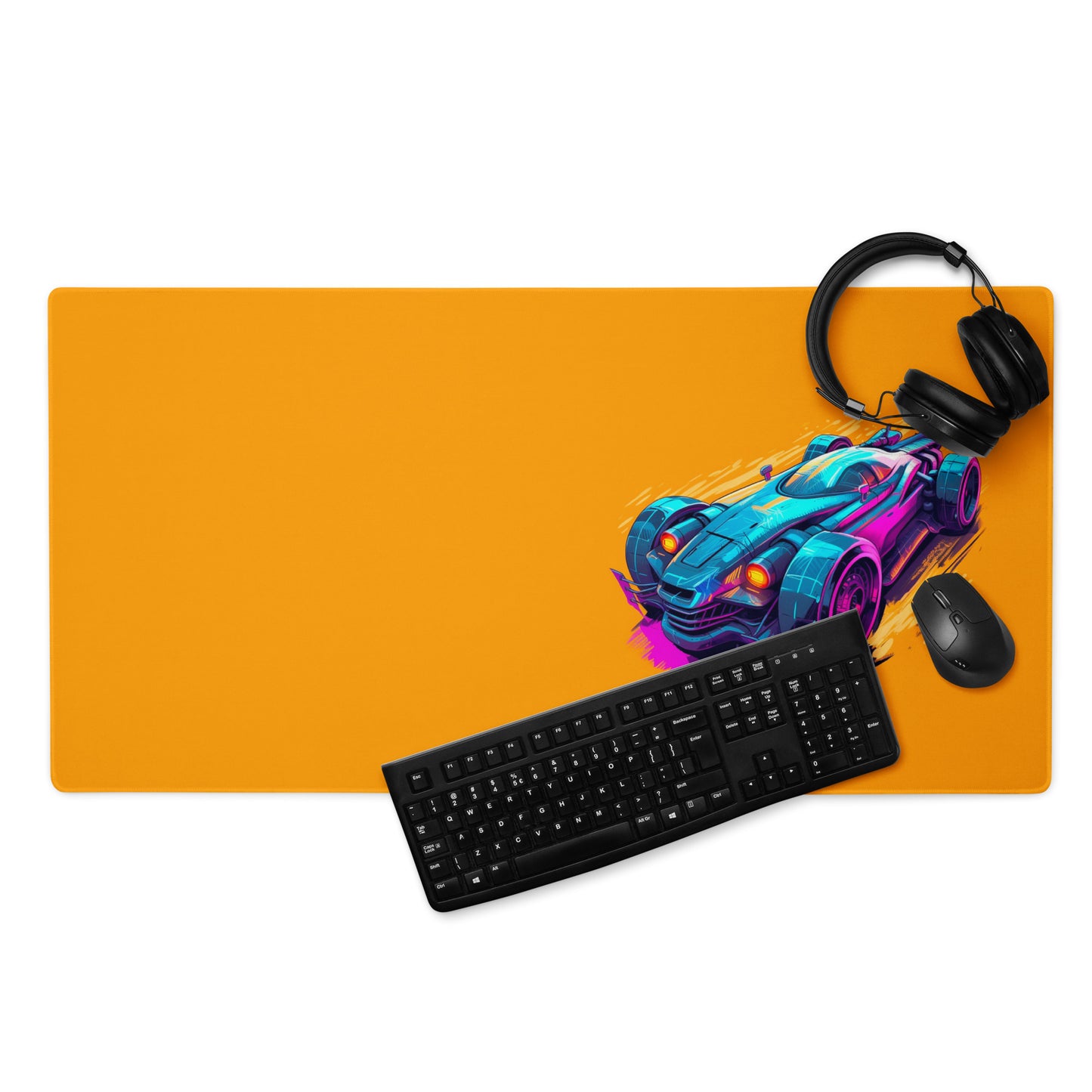 A 36" x 18" desk pad with a futuristic race car pictured on the right displayed with headphones, a keyboard and a mouse on it. Orange in color.