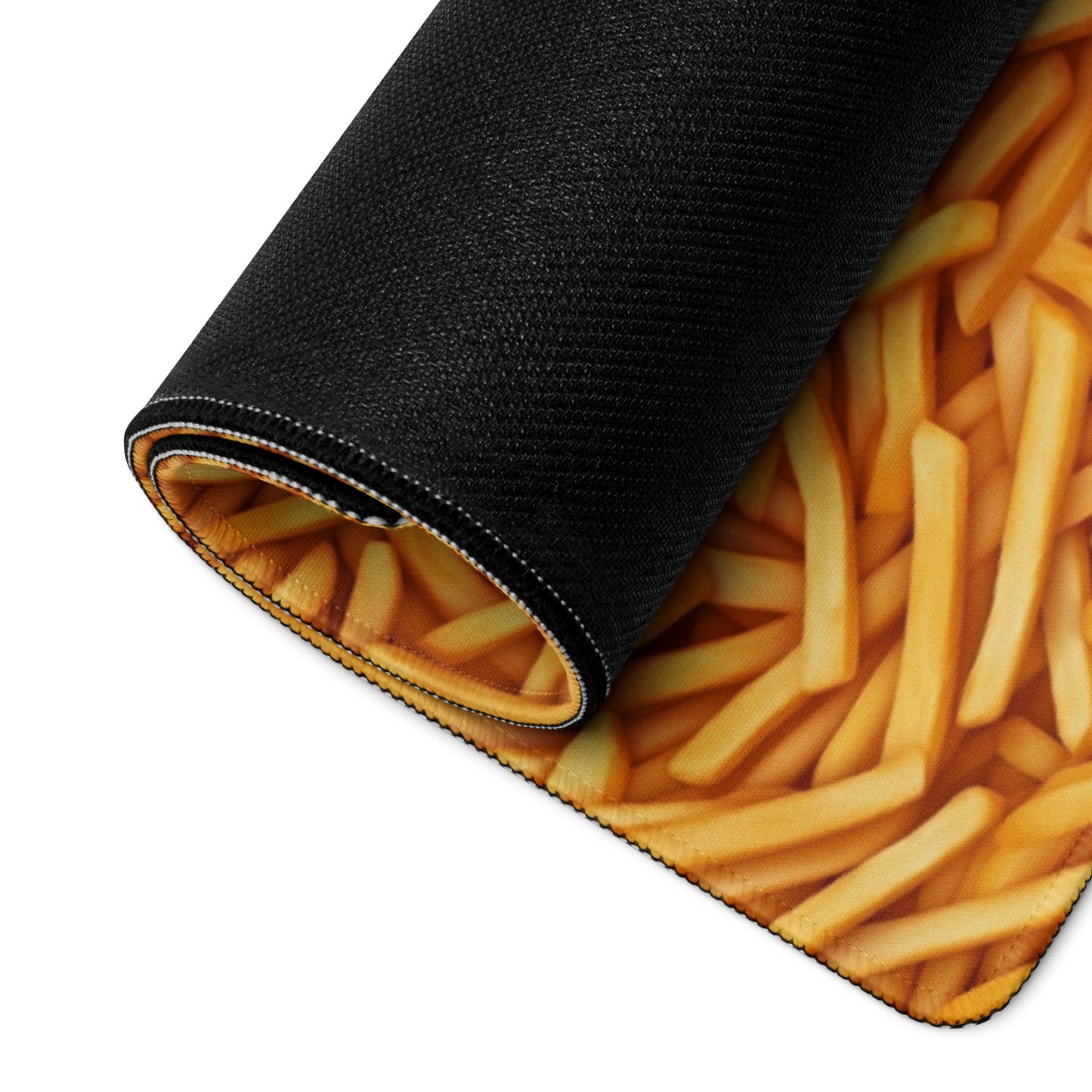 A 36" x 18" desk pad with a bunch of french fries all over it rolled up. Yellow in color.