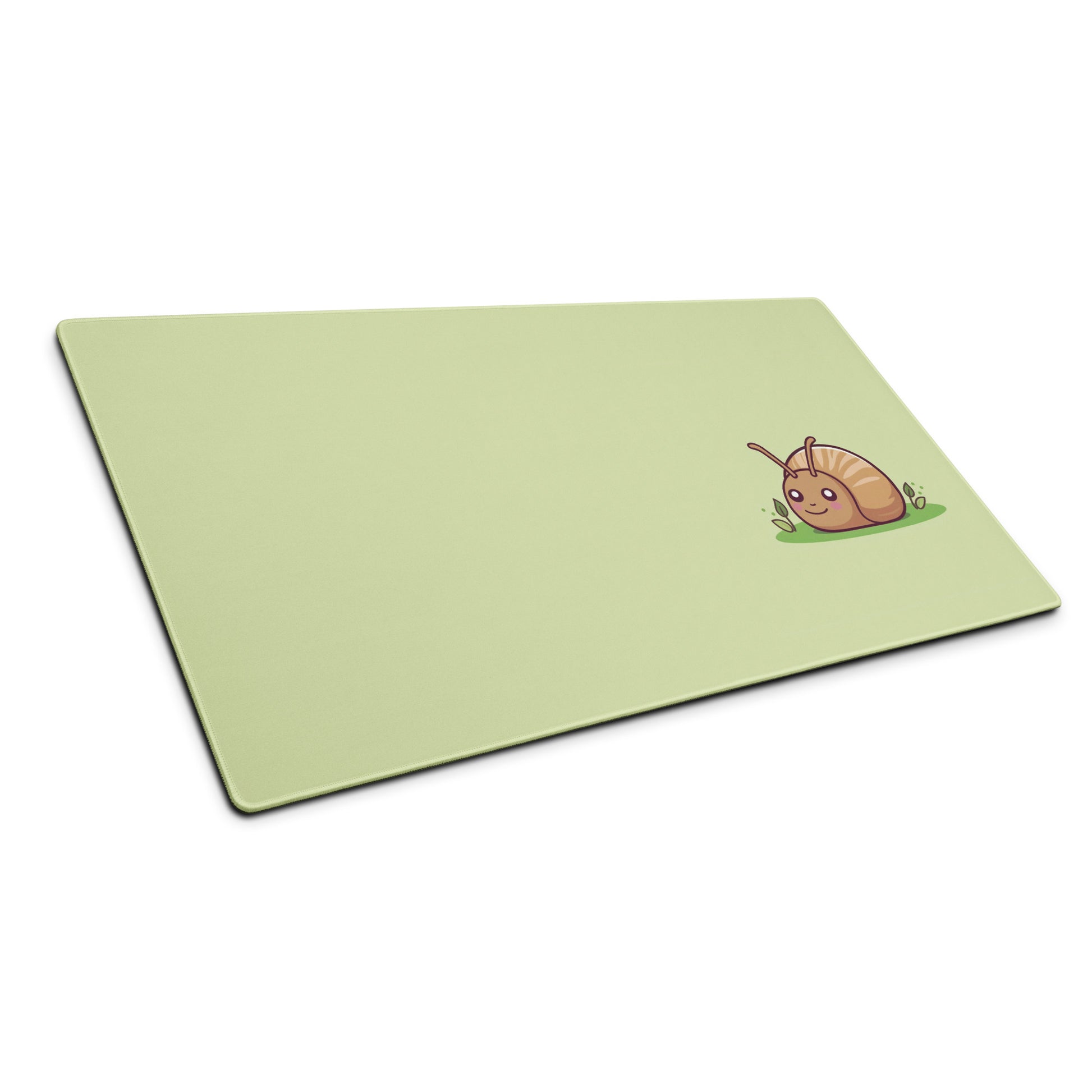 A 36" x 18" desk pad with a cute snail on it shown at an angle. Green in color.