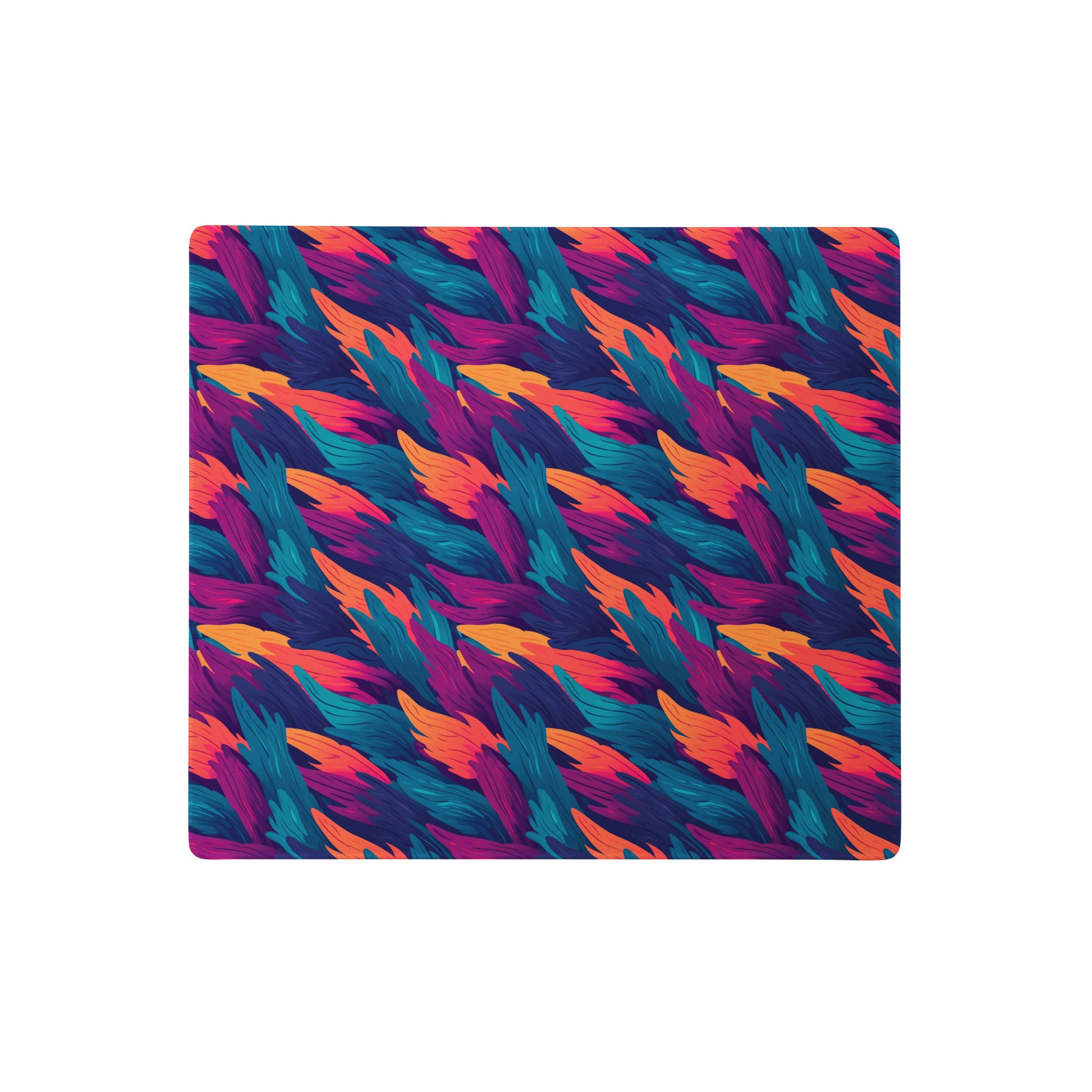 A 18" x 16" desk pad with a wavy flame pattern on it. Blue, Orange and Purple in color. 