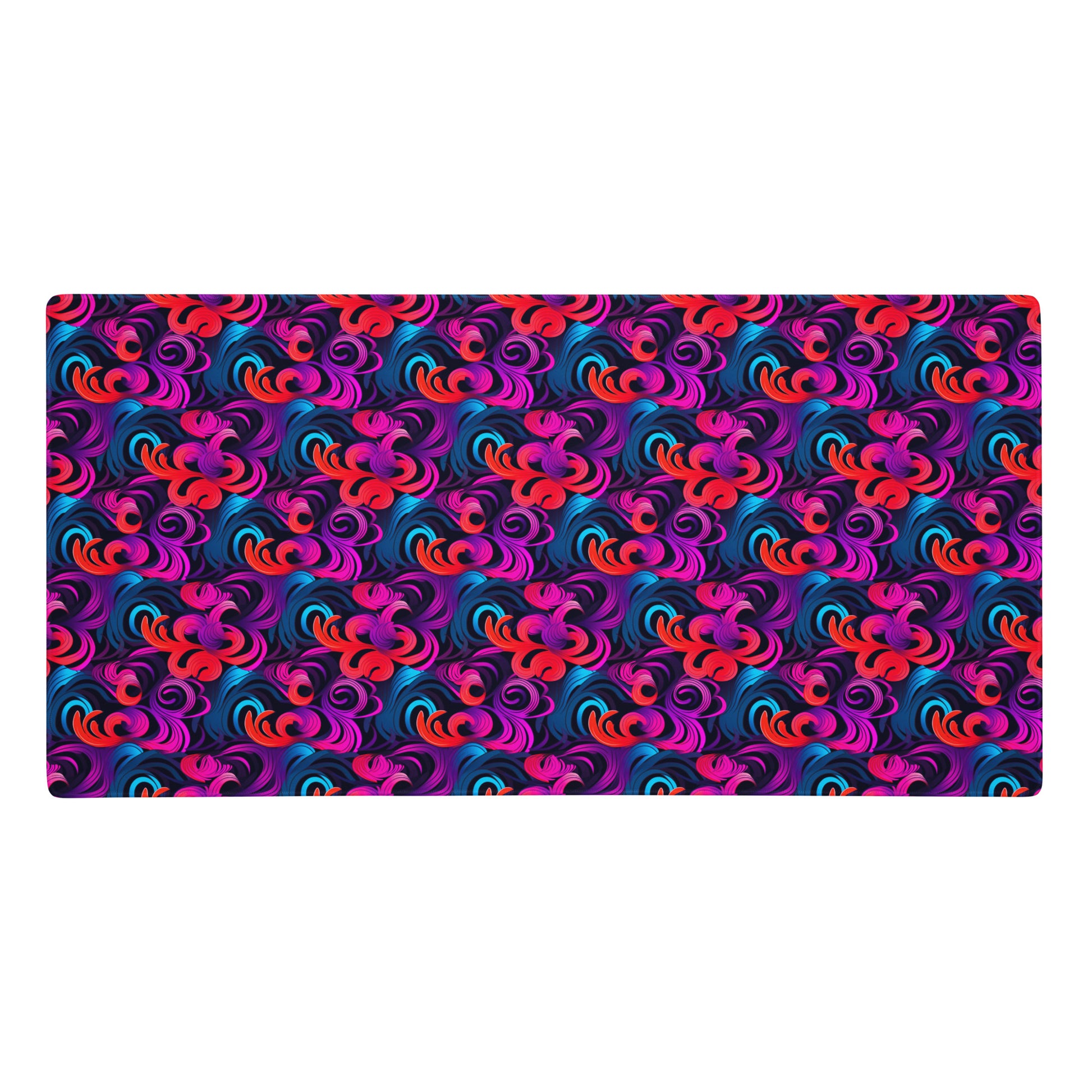 A 36" x 18" desk pad with a bright floral pattern all over it. Blue, Purple and Red in color.