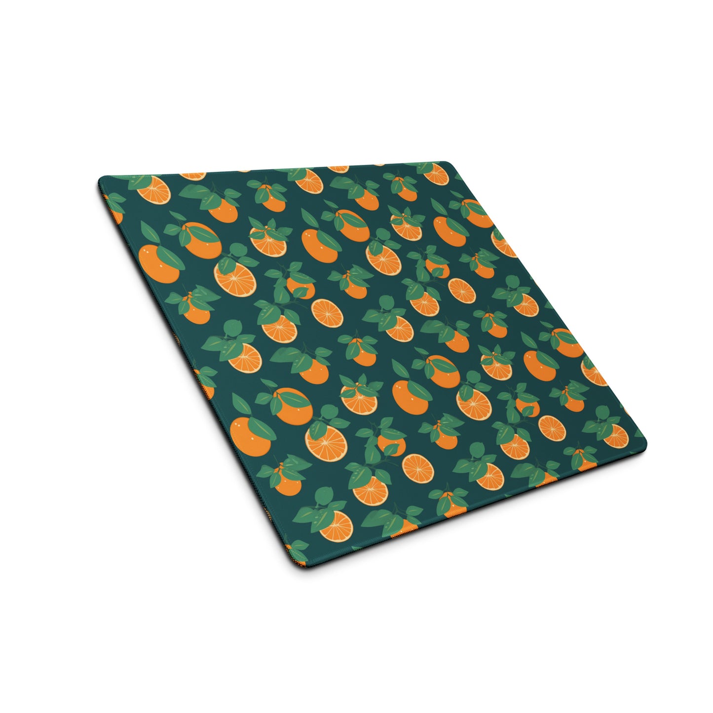 A 18" x 16" desk pad with oranges all over it shown at an angle. Orange and Blue in color.