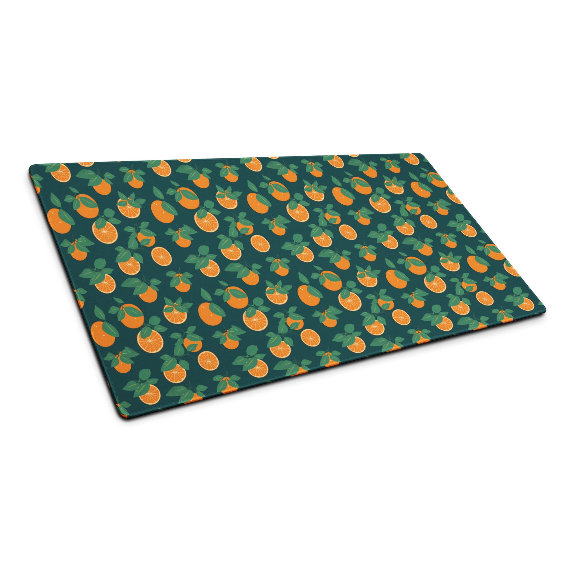 A 36" x 18" desk pad with oranges all over it shown at an angle. Orange and Blue in color.