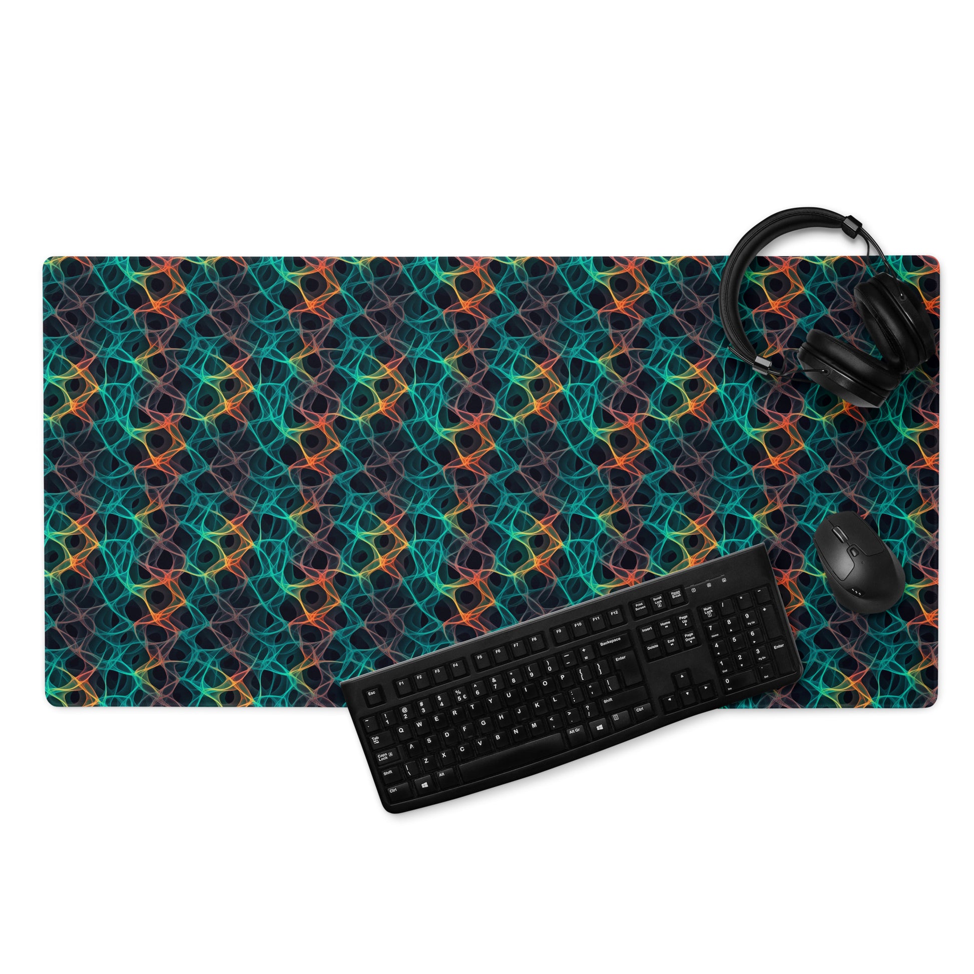 A 36" x 18" desk pad with an abstract pattern resembling a cell structure on it displayed with a keyboard, headphones and a mouse. Rainbow in color.