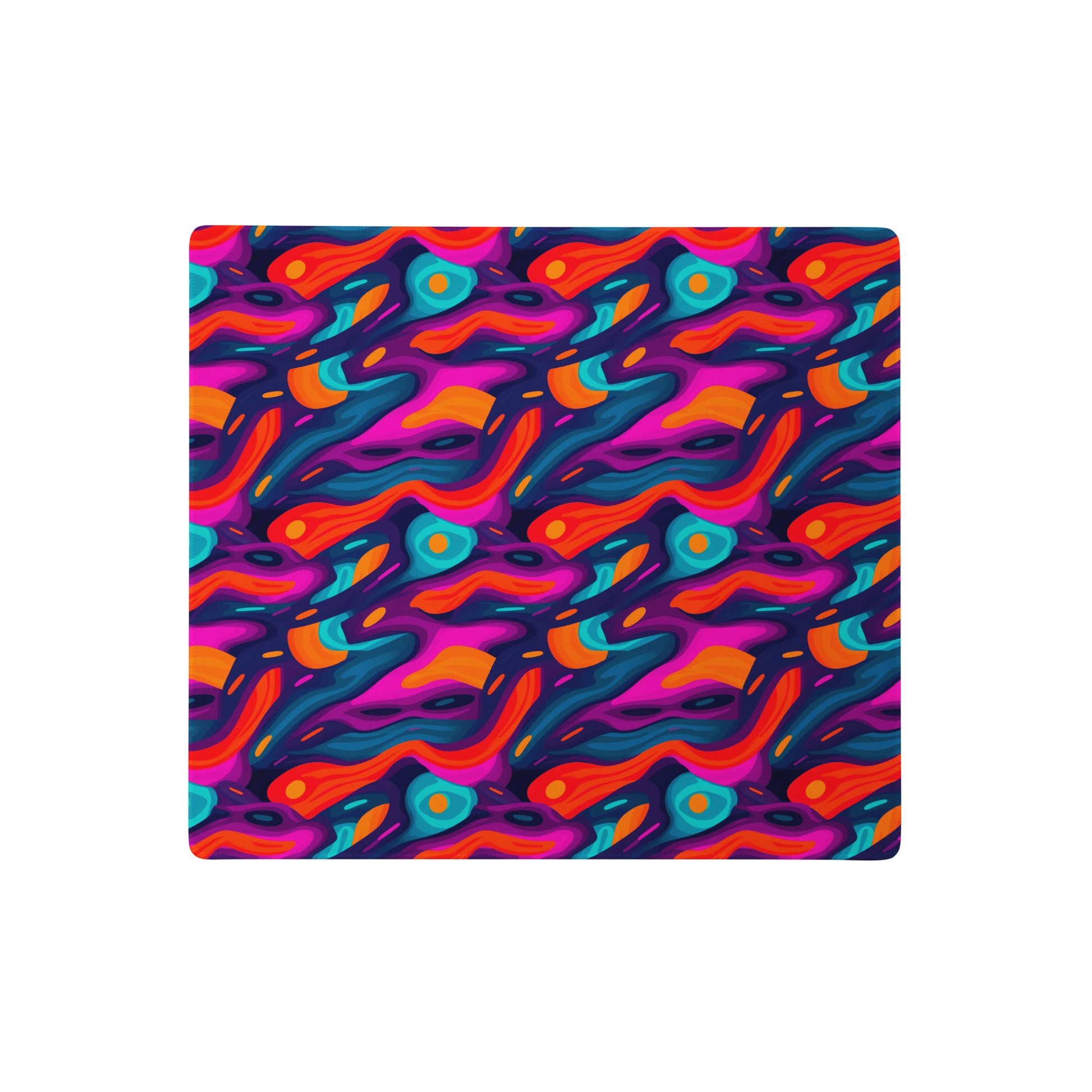 A 18" x 16" desk pad with a wavy abstract pattern on it. Blue, Purple and Red in color.