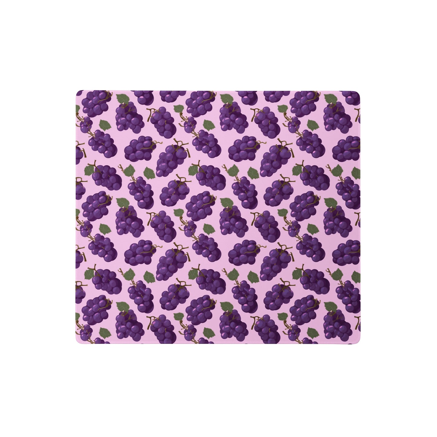 A 18" x 16" desk pad with bushels of grapes all over it. Purple in color.