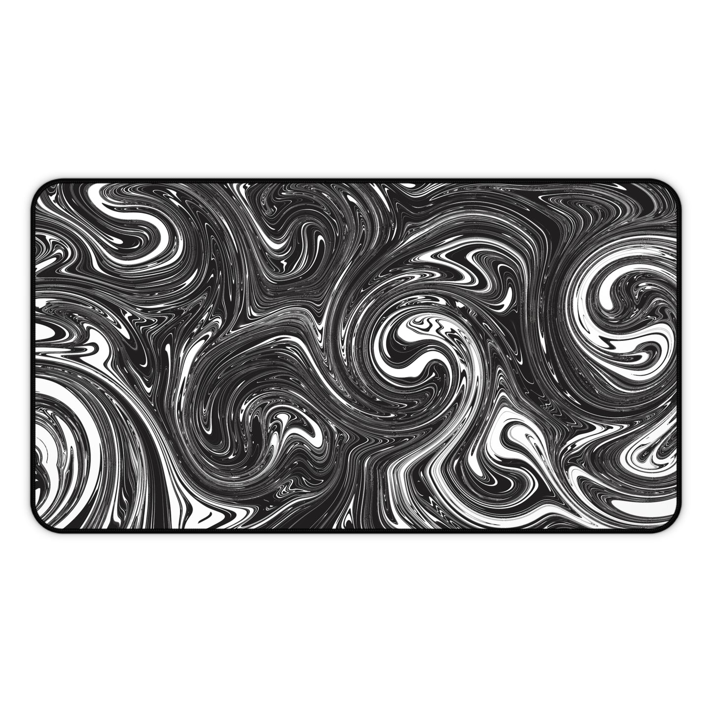 A 12" x 22" desk mat with black and white swirls.