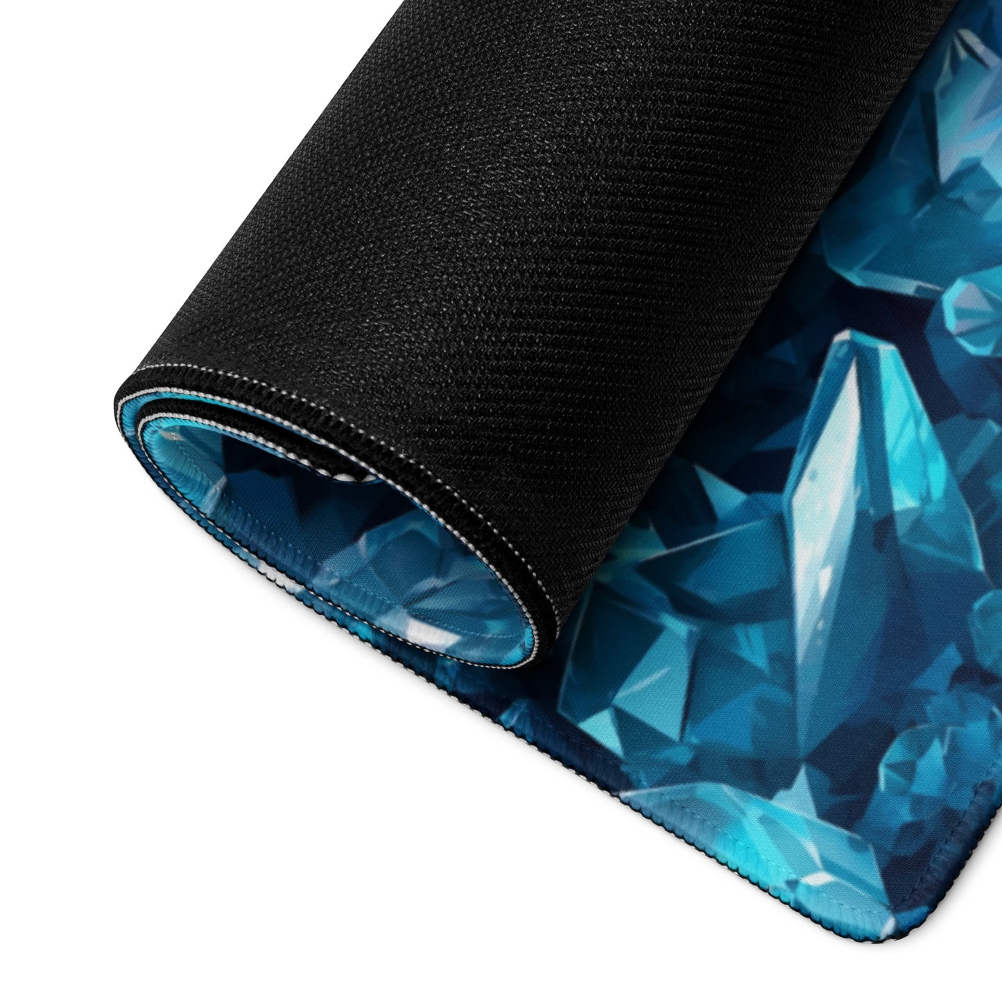 A blue crystal gaming desk pad rolled up.