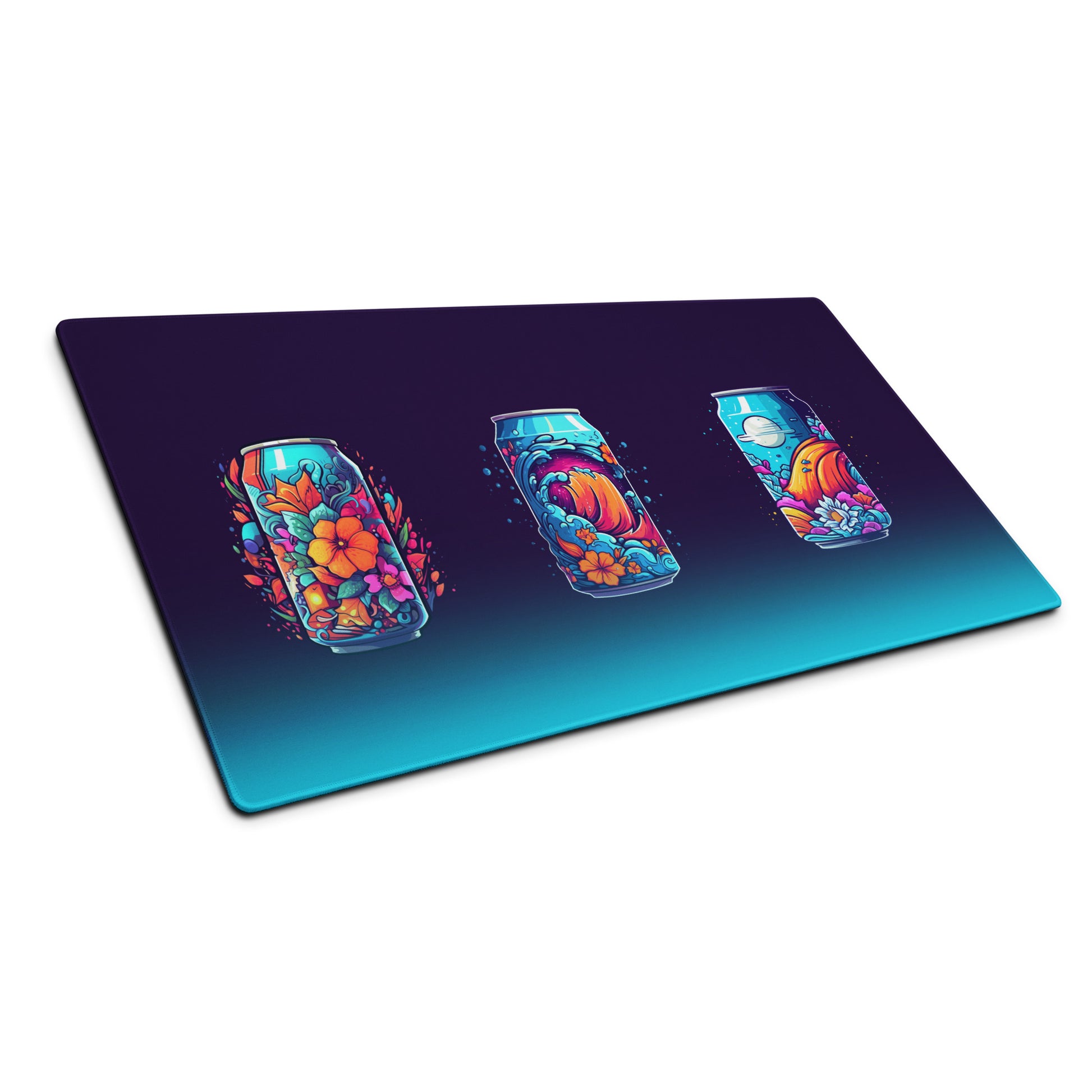 A 36" x 18" desk pad three soda cans that have a floral, wave, or space design sitting at an angle.