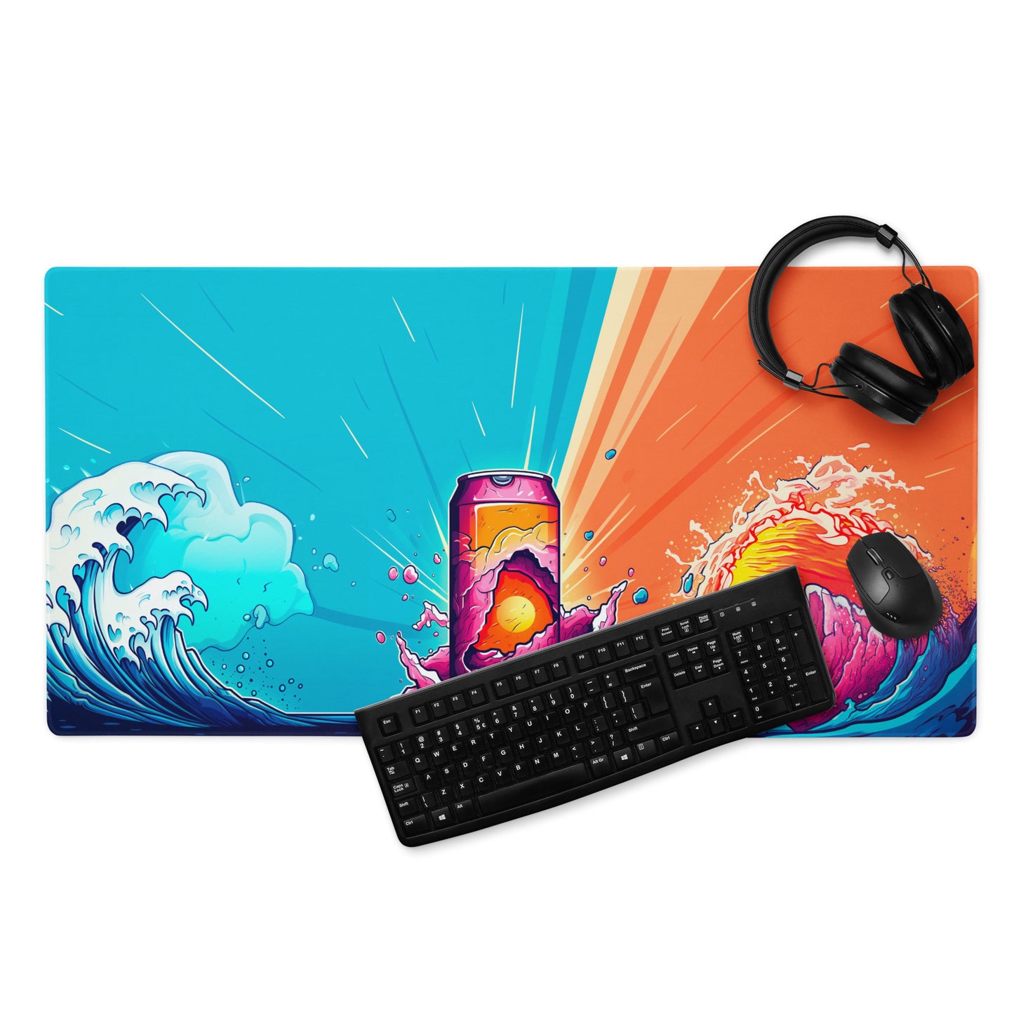 A 36" x 18" blue and orange desk pad with a soda can in the middle . With a keyboard, mouse, and headphones sitting on it.