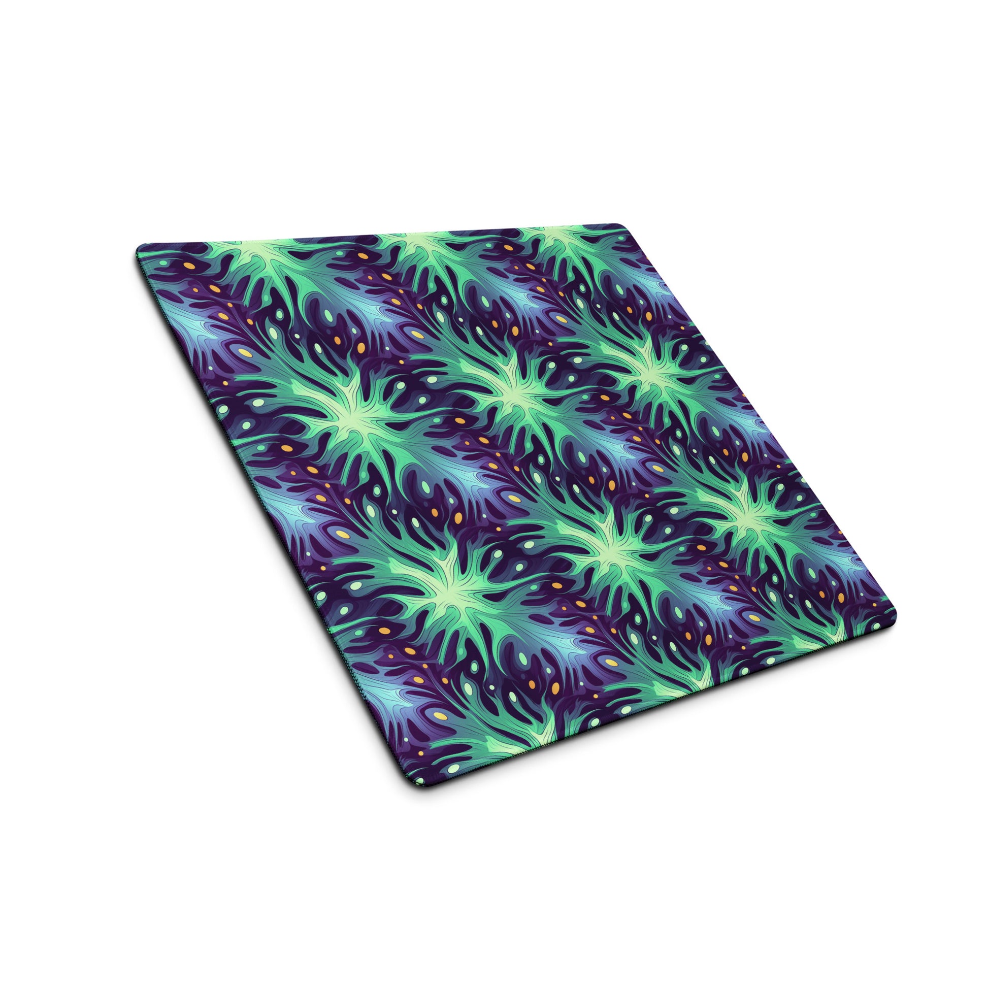 A 36" x 18" desk pad with a green and blue abstract pattern sitting at an angle.
