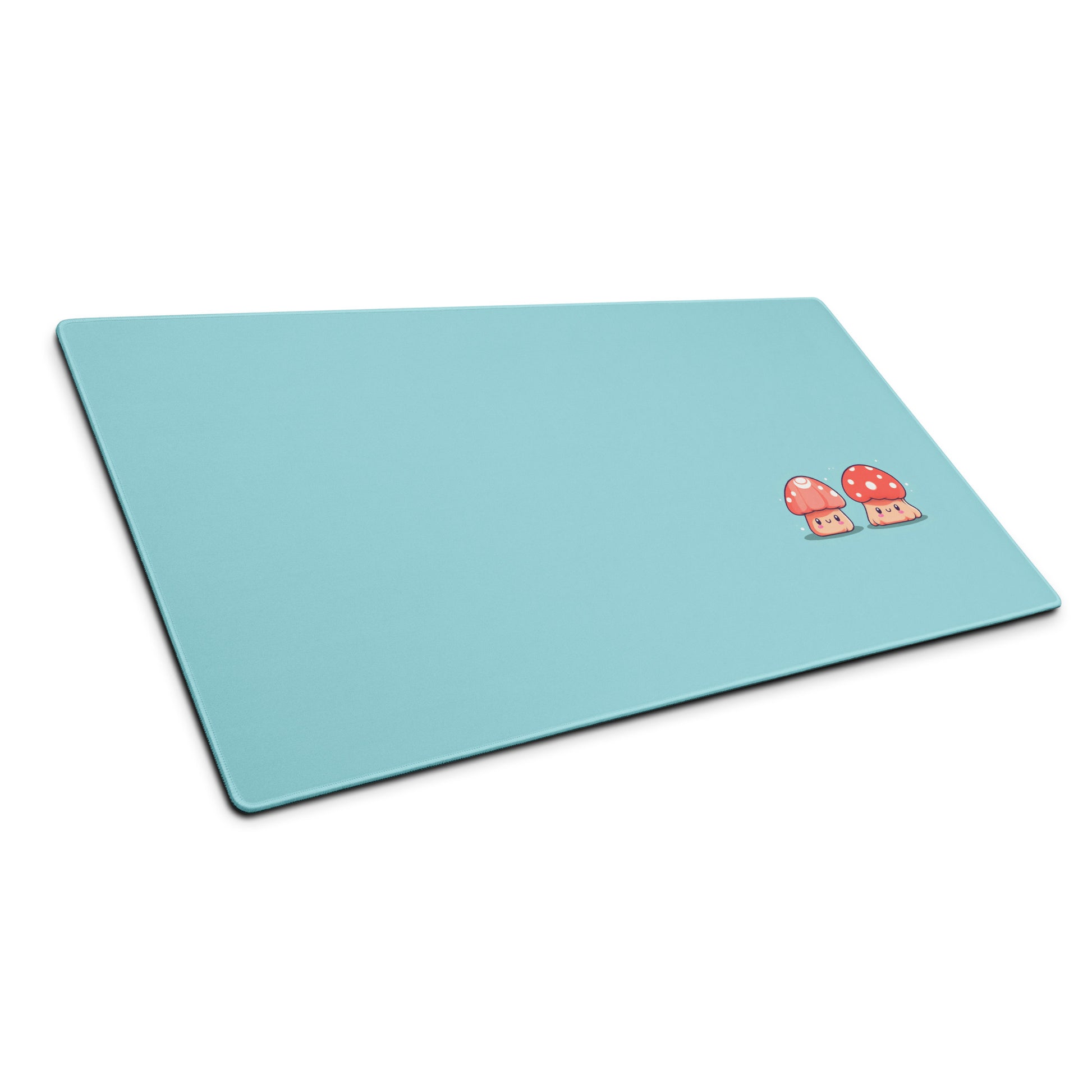 A gaming desk pad with two kawaii mushrooms on a blue background sitting at an angle.