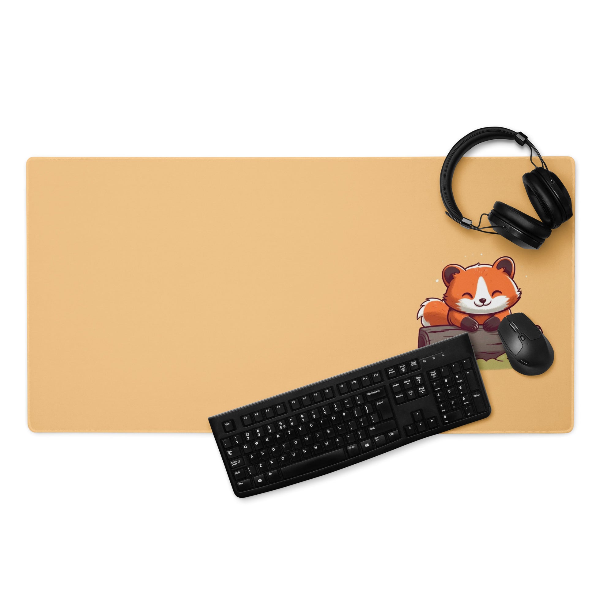 A gaming desk pad with a kawaii red panda smiling and leaning on a log. The background of the desk mat is orange. A keyboard, mouse, and headphones sit on the desk mat.