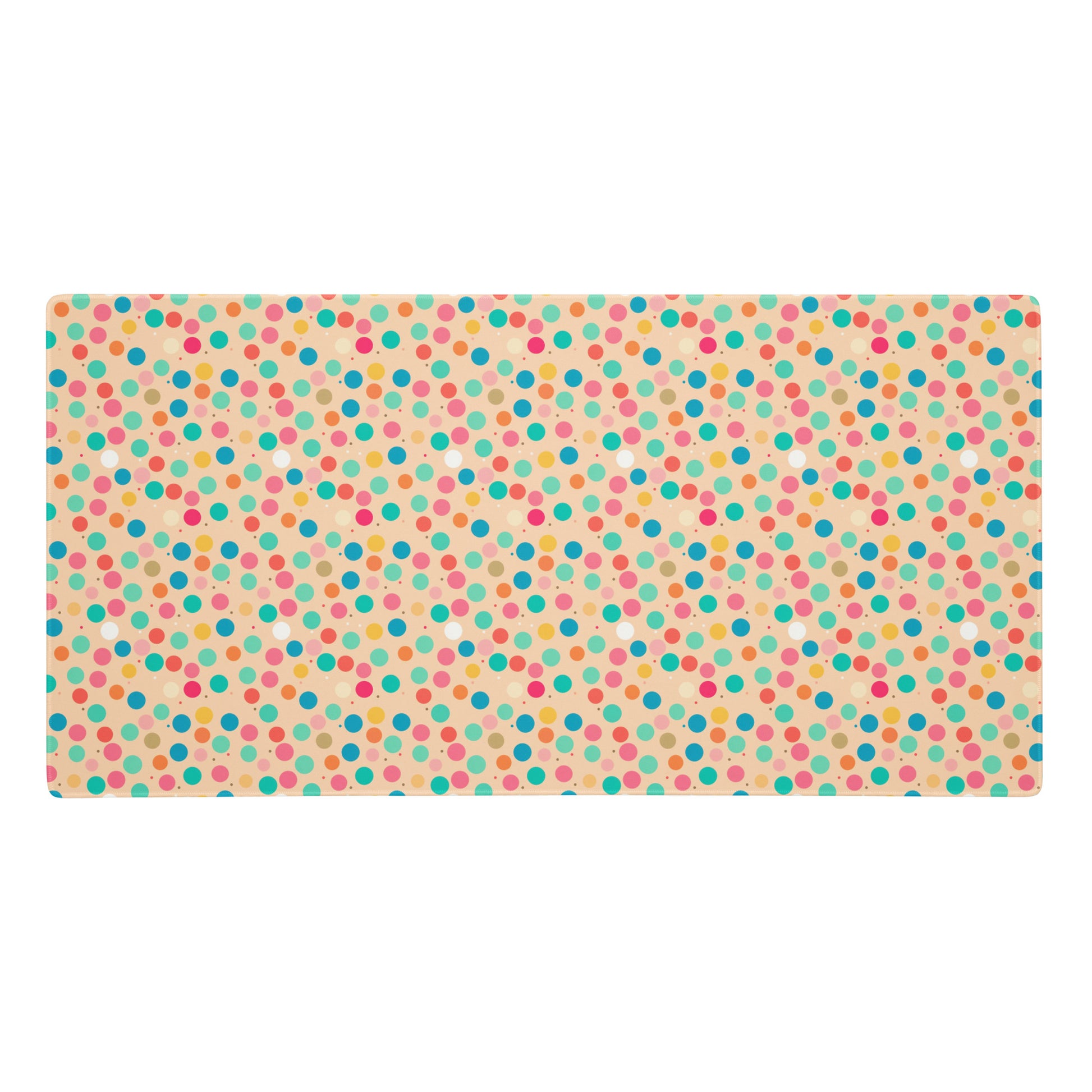 A 36" x 18" desk pad with a colorful polka dot pattern.