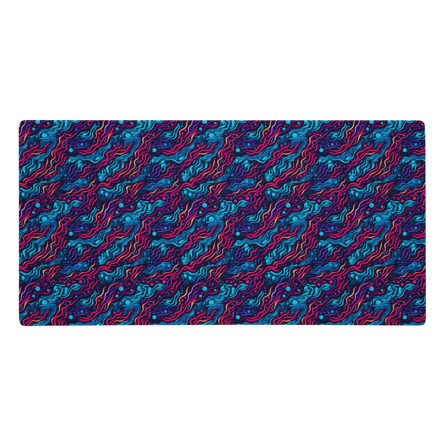 A 36" x 18" desk pad with wavy blue and pink pattern.