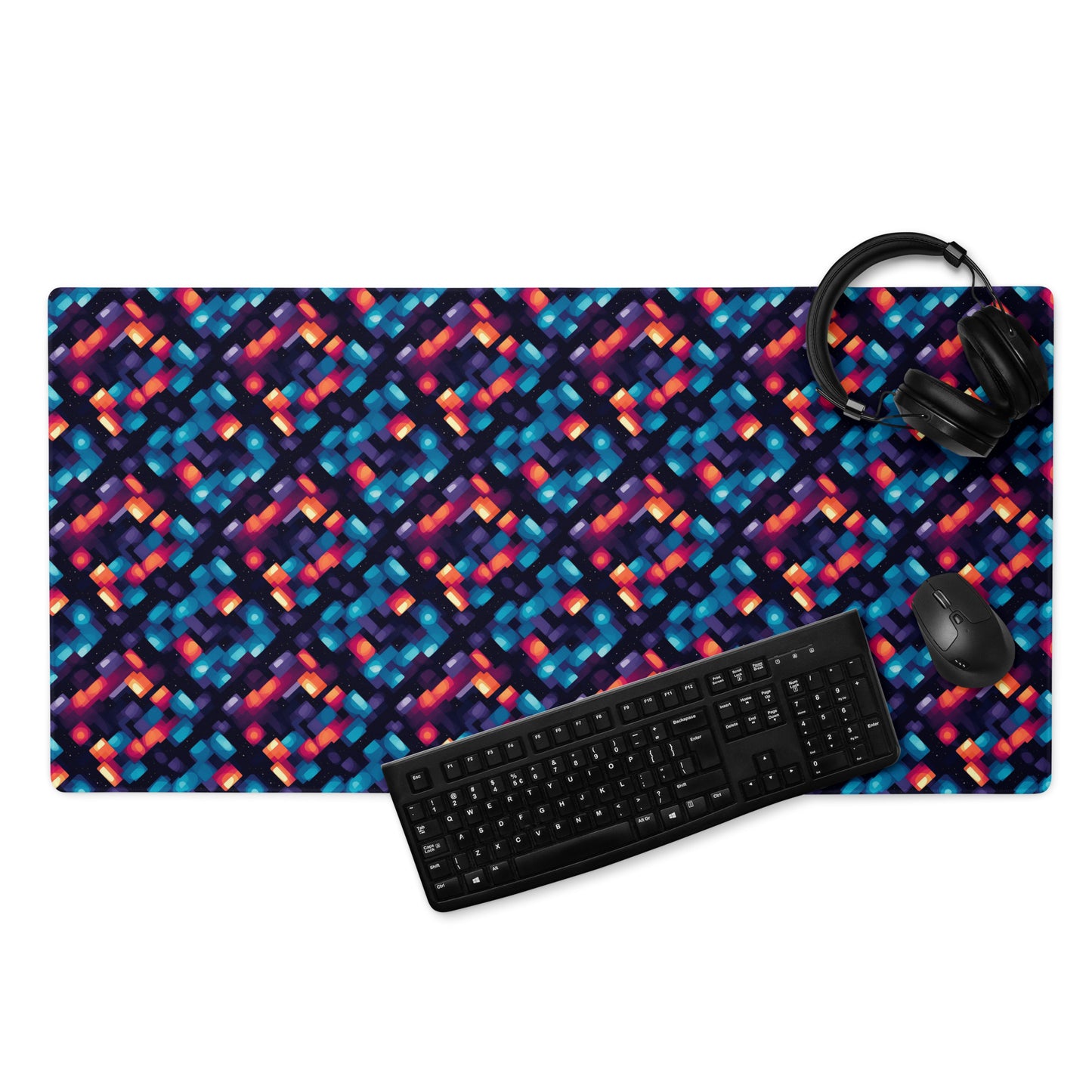 alt text- A 36" x 18" desk pad with blue and orange abstract pattern. With a keyboard, mouse, and headphones sitting on it.