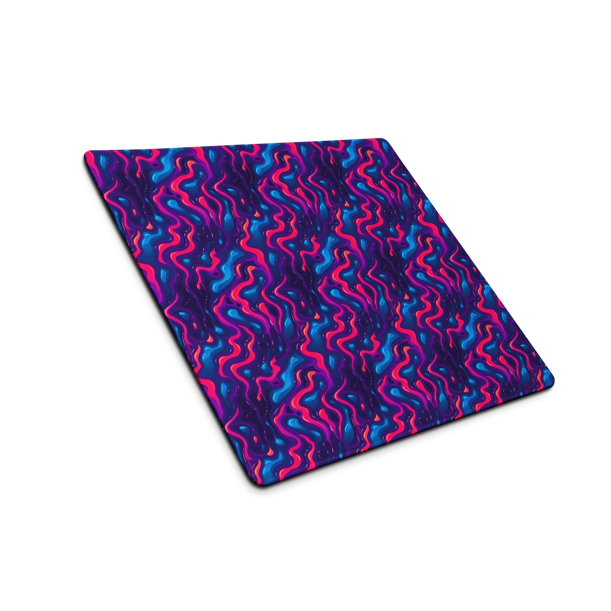 A 18" x 16" desk pad with a pink, blue and purple wavy pattern sitting at an angle.