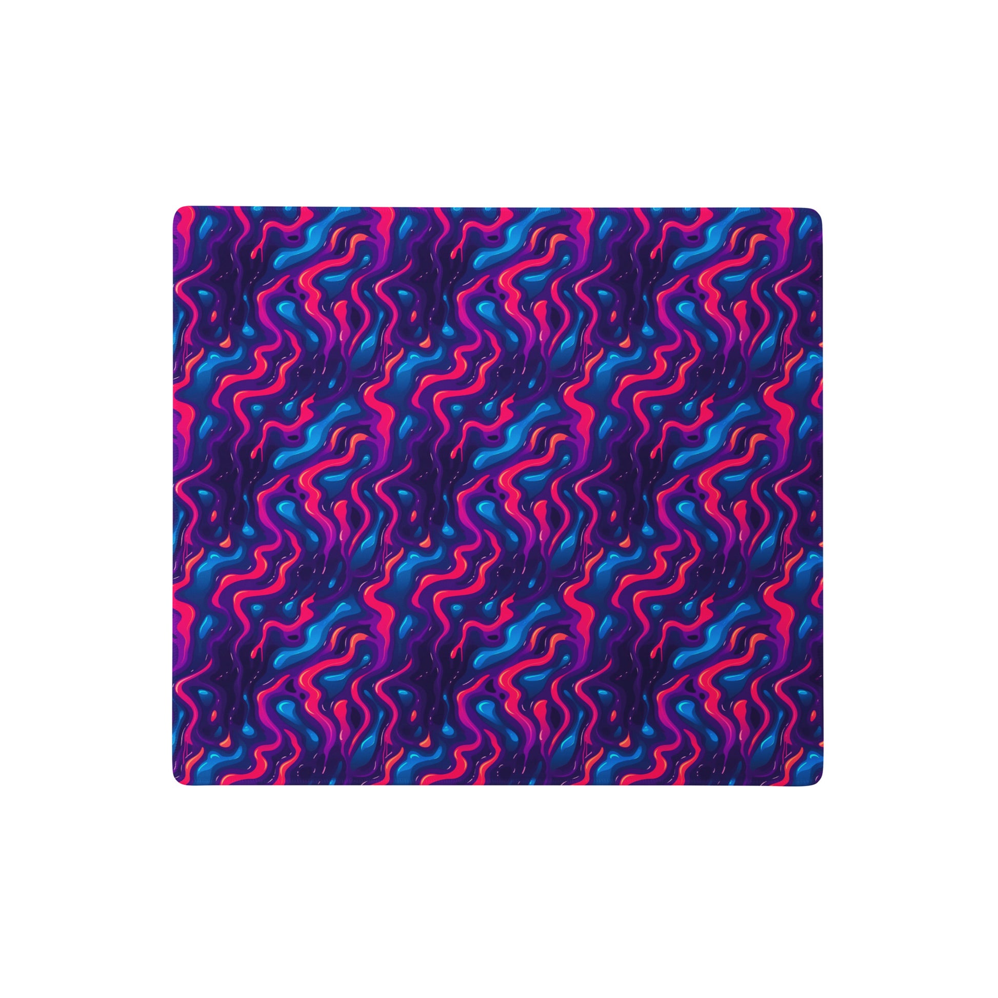 A 18" x 16" desk pad with a pink, blue and purple wavy pattern.