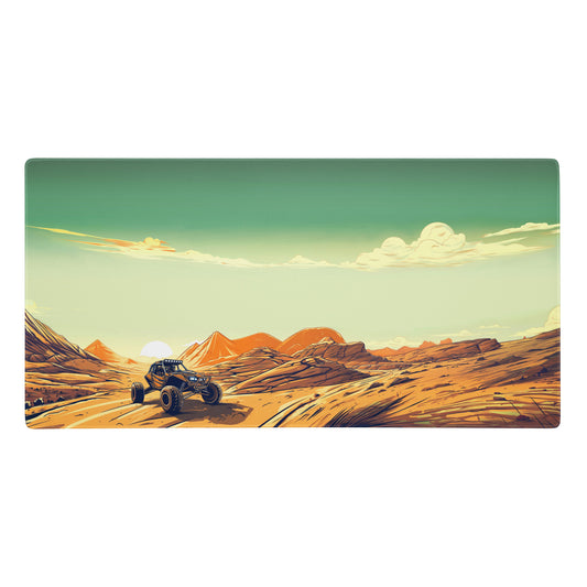 A 36" x 18" desk pad with a dune buggy in a desert landscape.