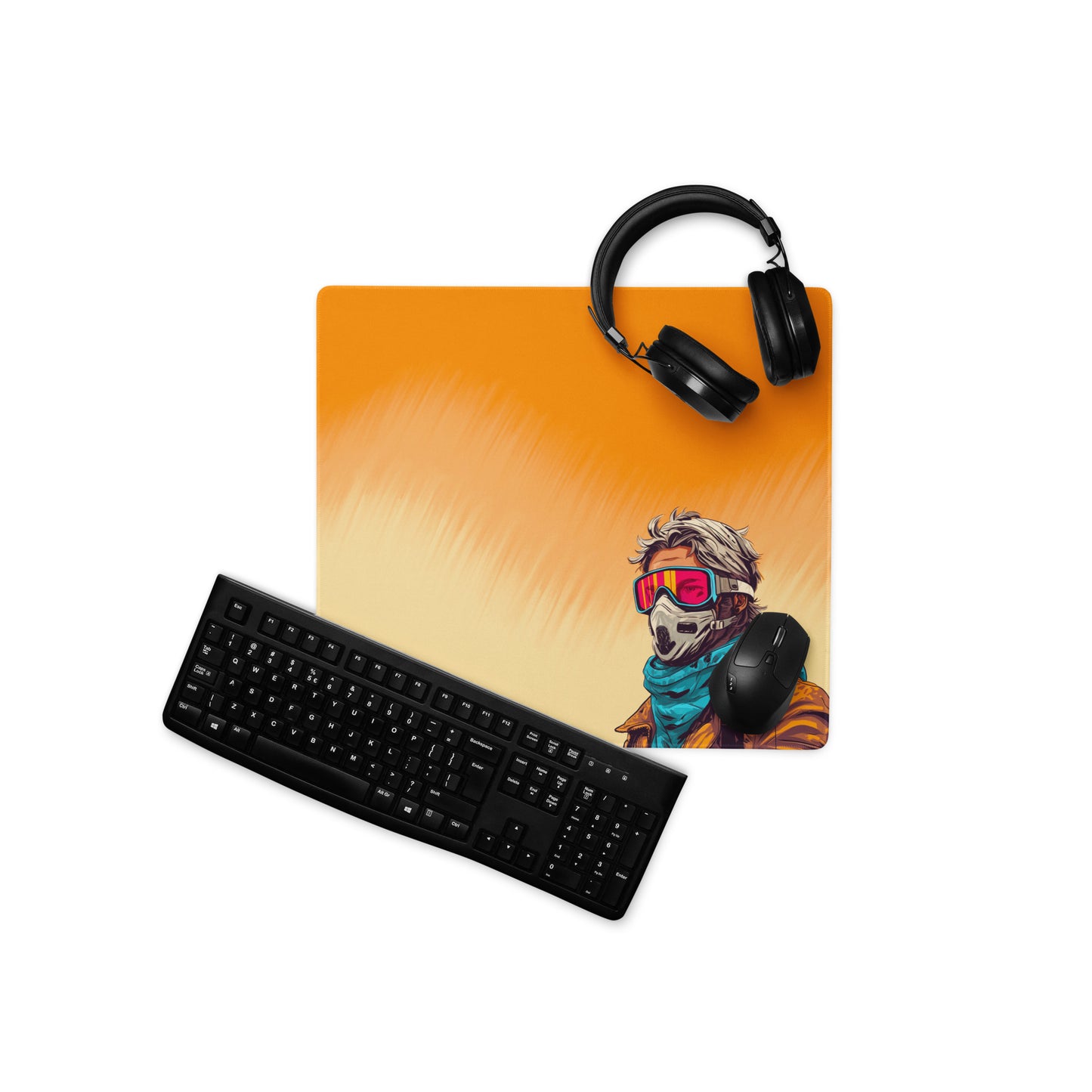 A 18" x 16" desk pad with a man standing in a sandstorm. With a keyboard, mouse, and headphones sitting on it.