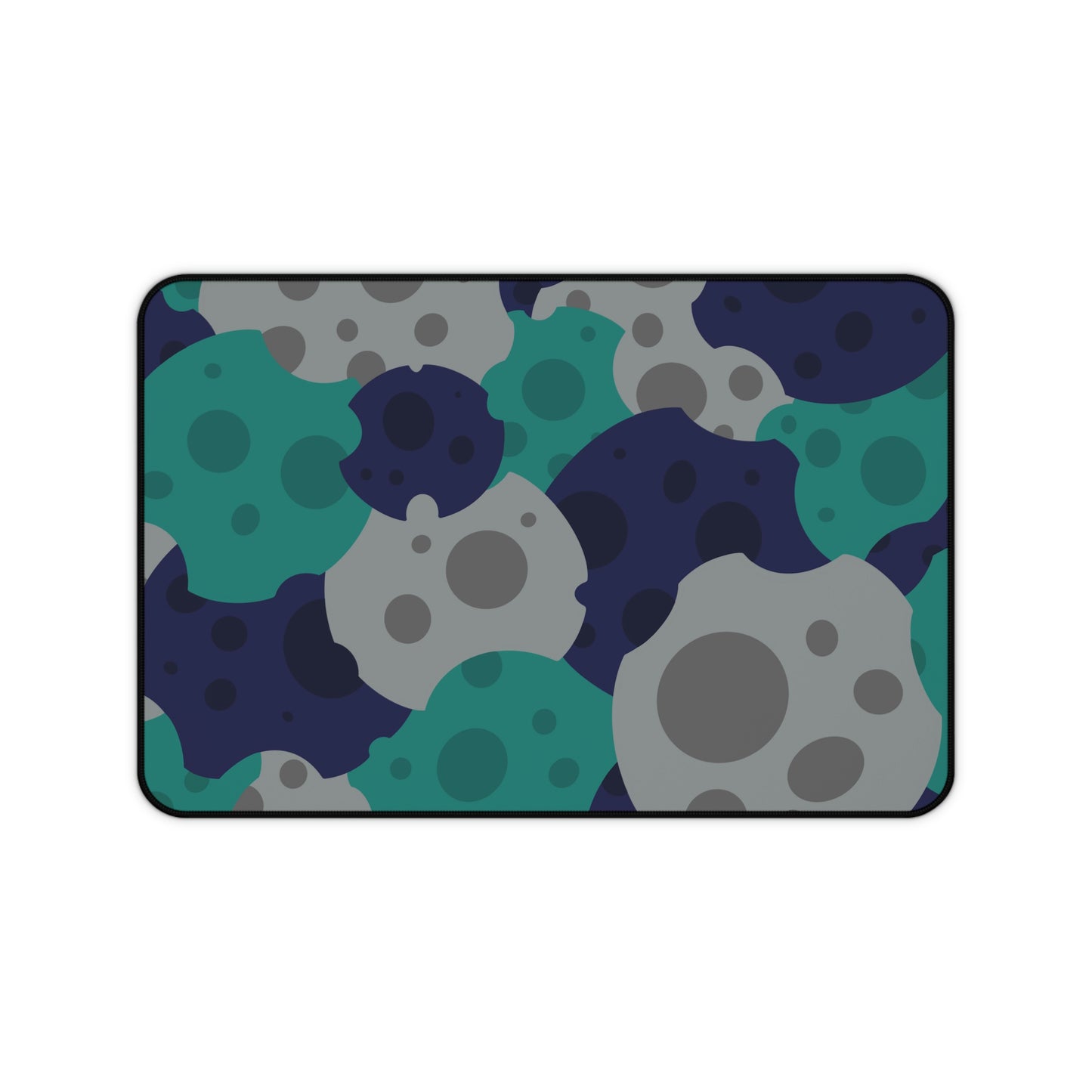 A 12" x 18" desk mat with gray, teal, and dark blue meteorites.
