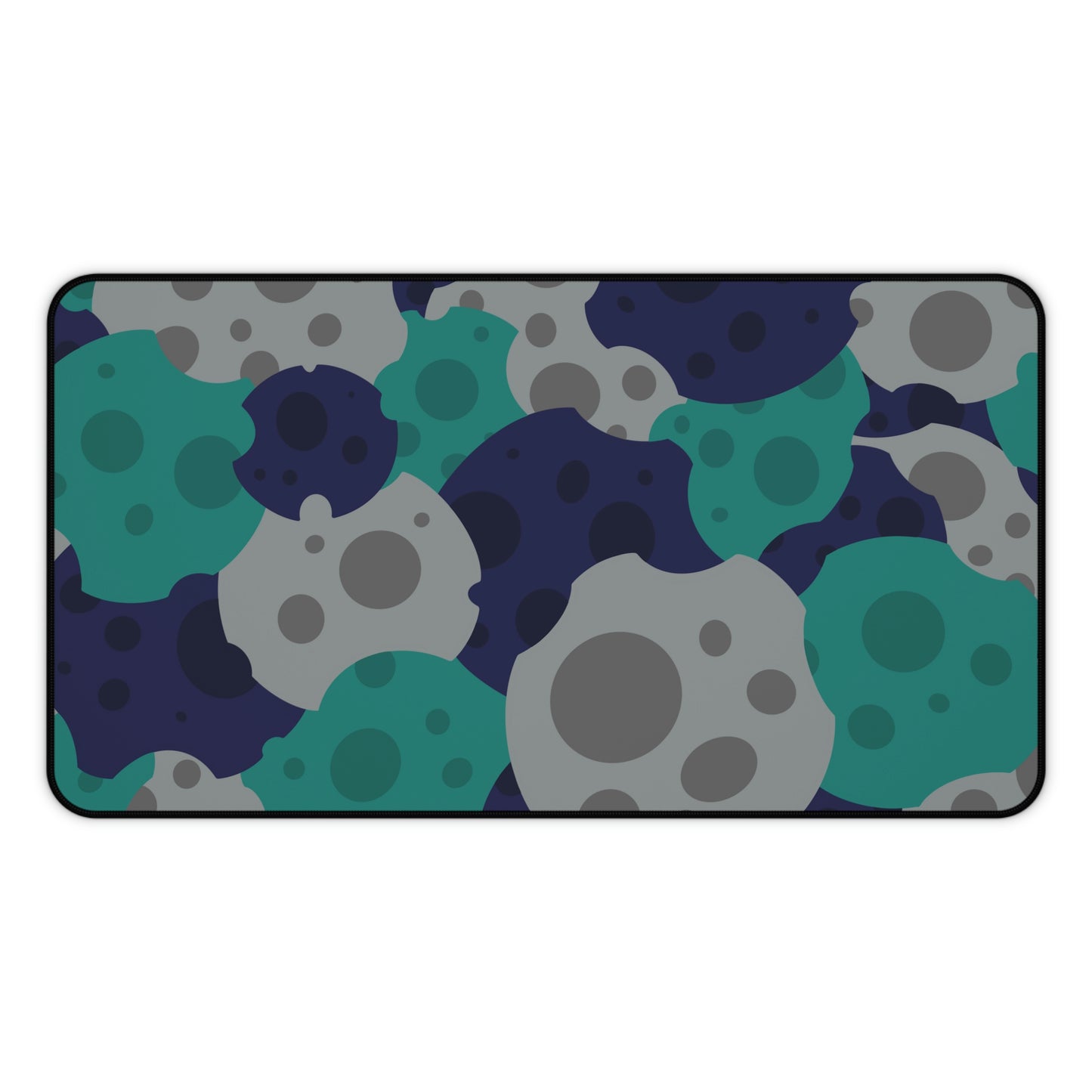 A 12" x 22" desk mat with gray, teal, and dark blue meteorites.