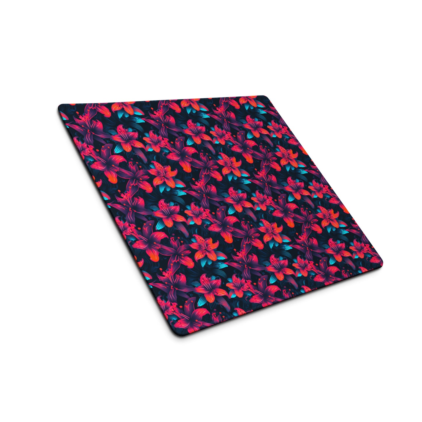 A 18" x 16" desk pad with a neon red and blue floral pattern sitting at an angle.