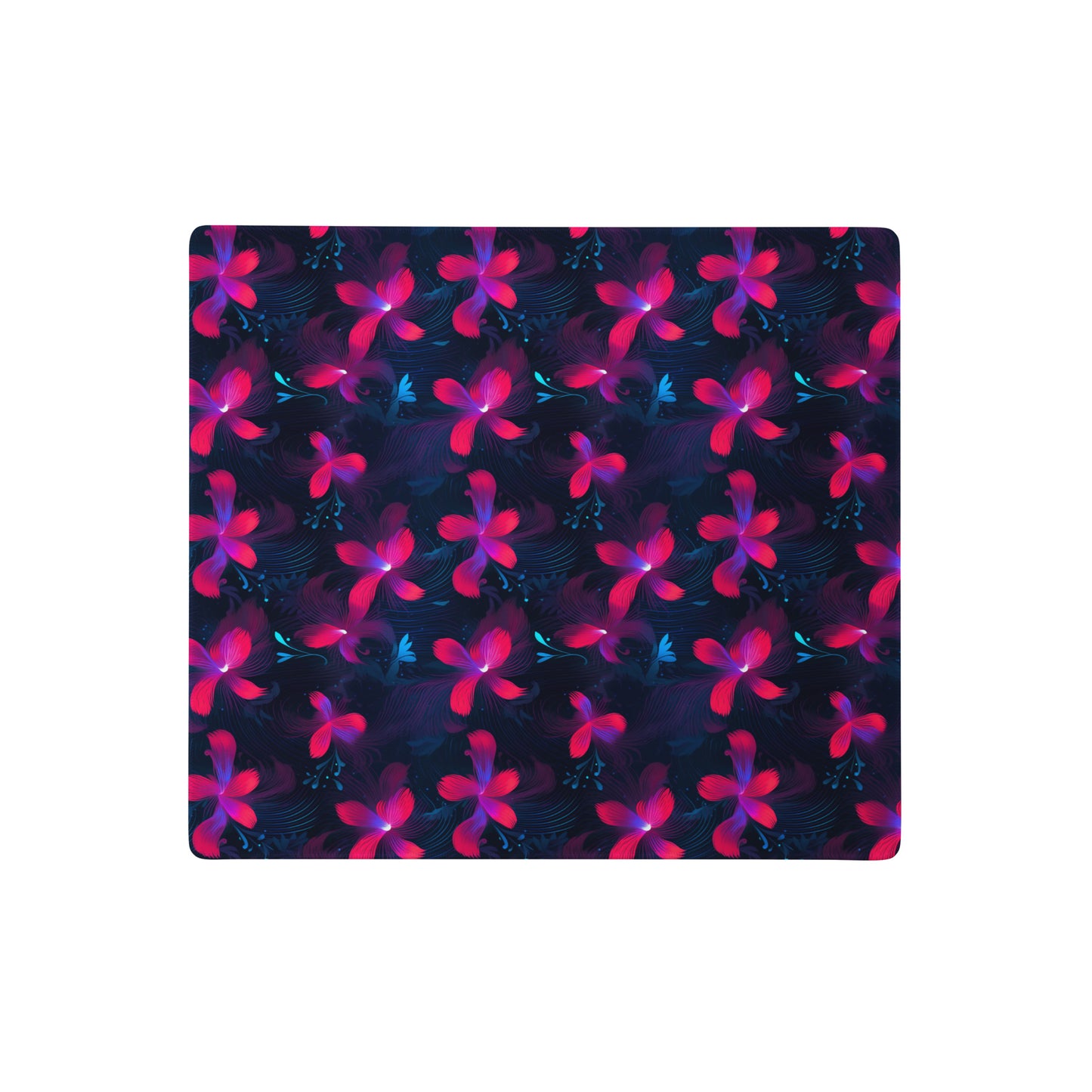 A 18" x 16" desk pad with neon pink and blue floral pattern.